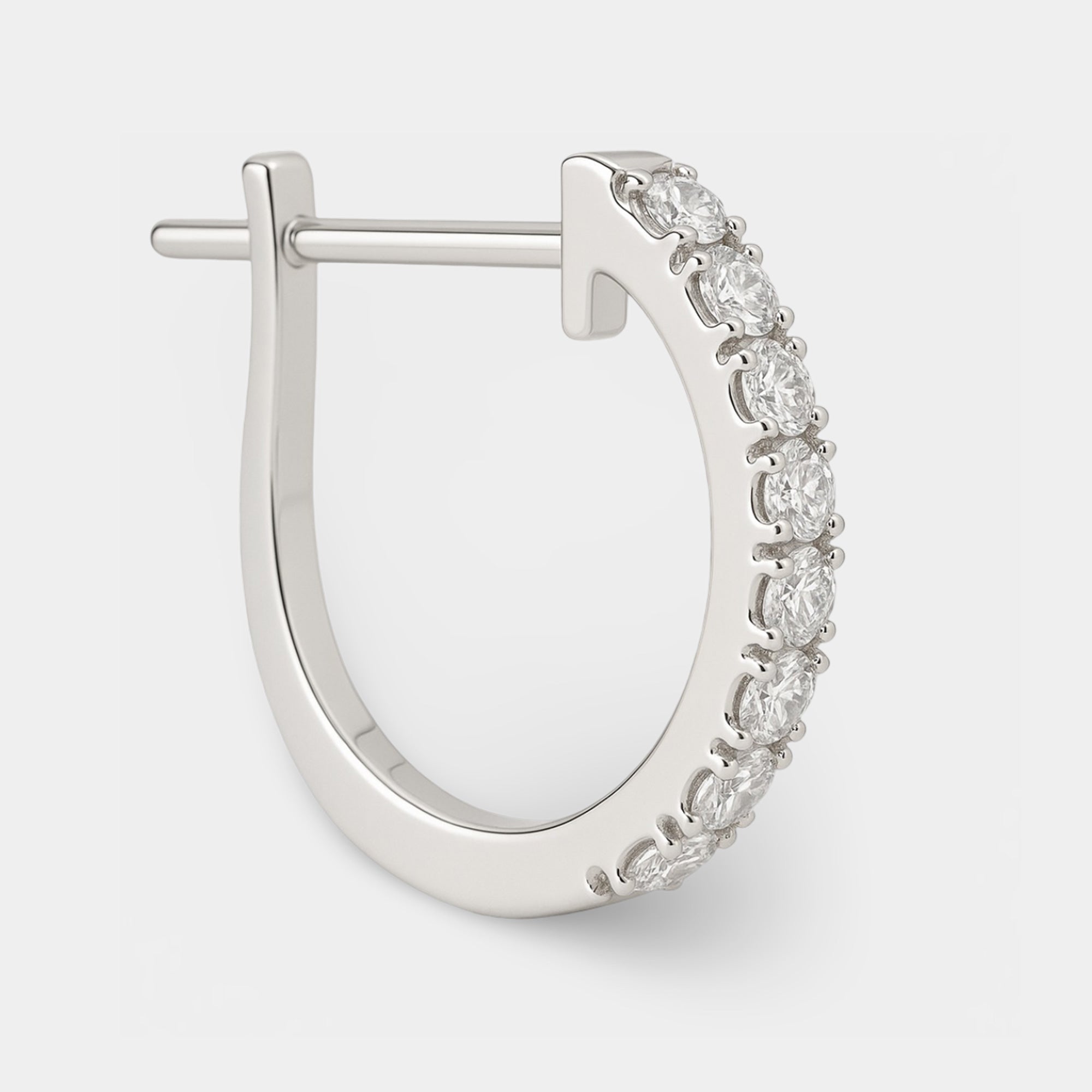 Cubic zirconia huggie hoops shown in the MH Elegance gift box