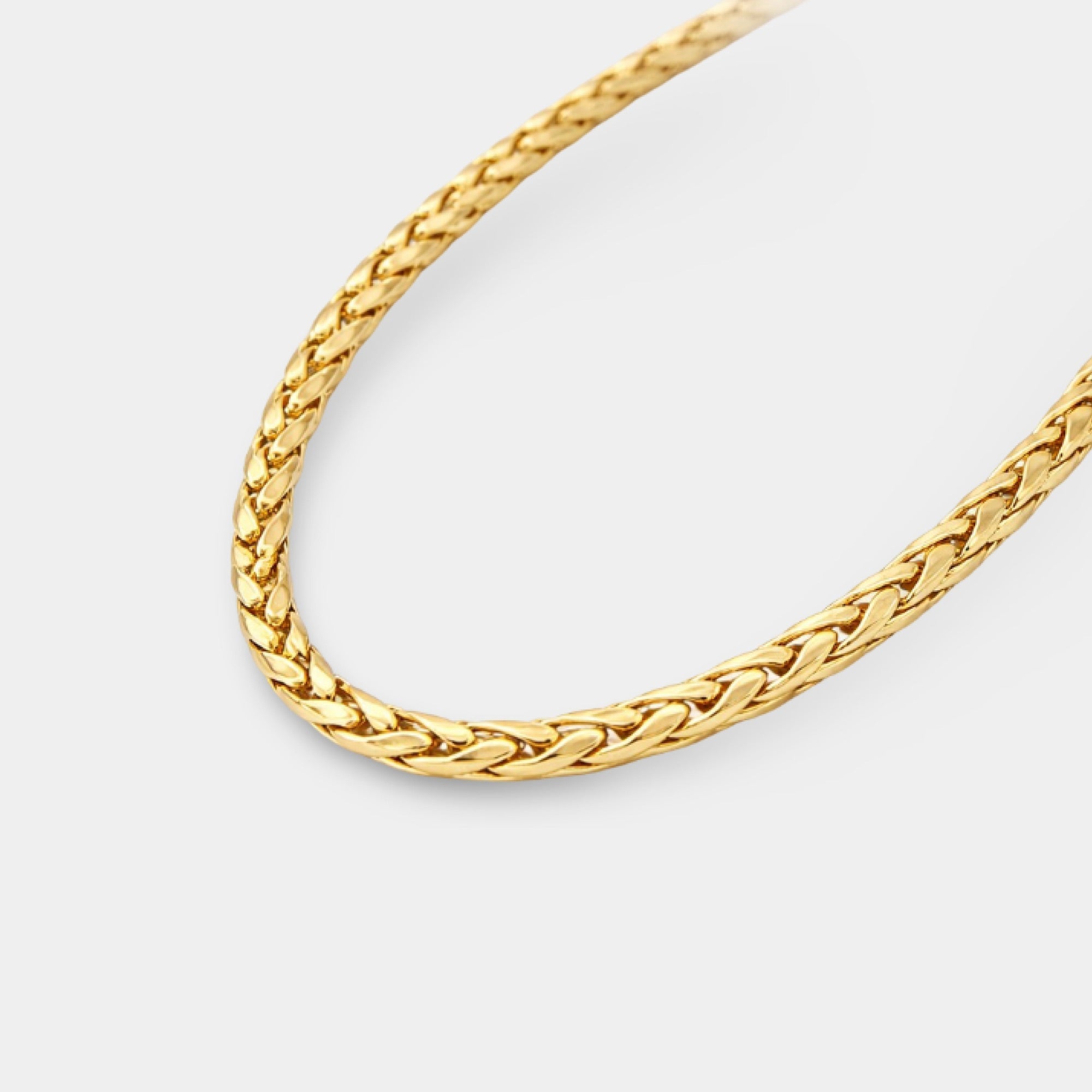 MH Elegance 24K gold plated wheat weave chain necklace shown coiled to show the woven texture