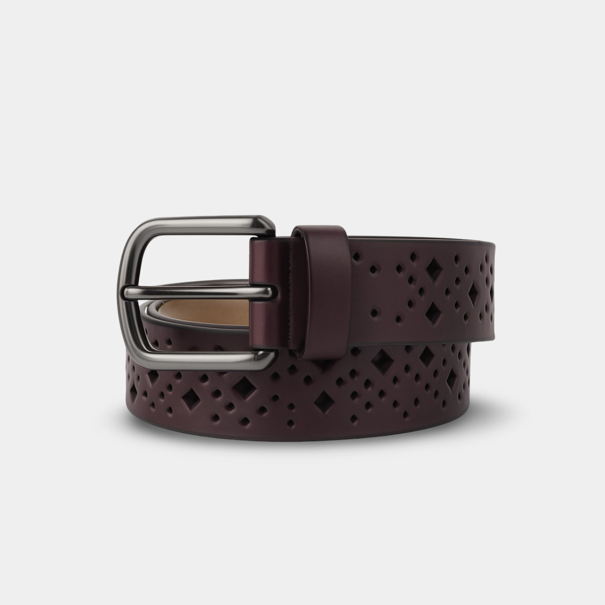 Hollow leather belt draped elegantly, showing sleek profile and minimalist design suitable for professional business and casual styling