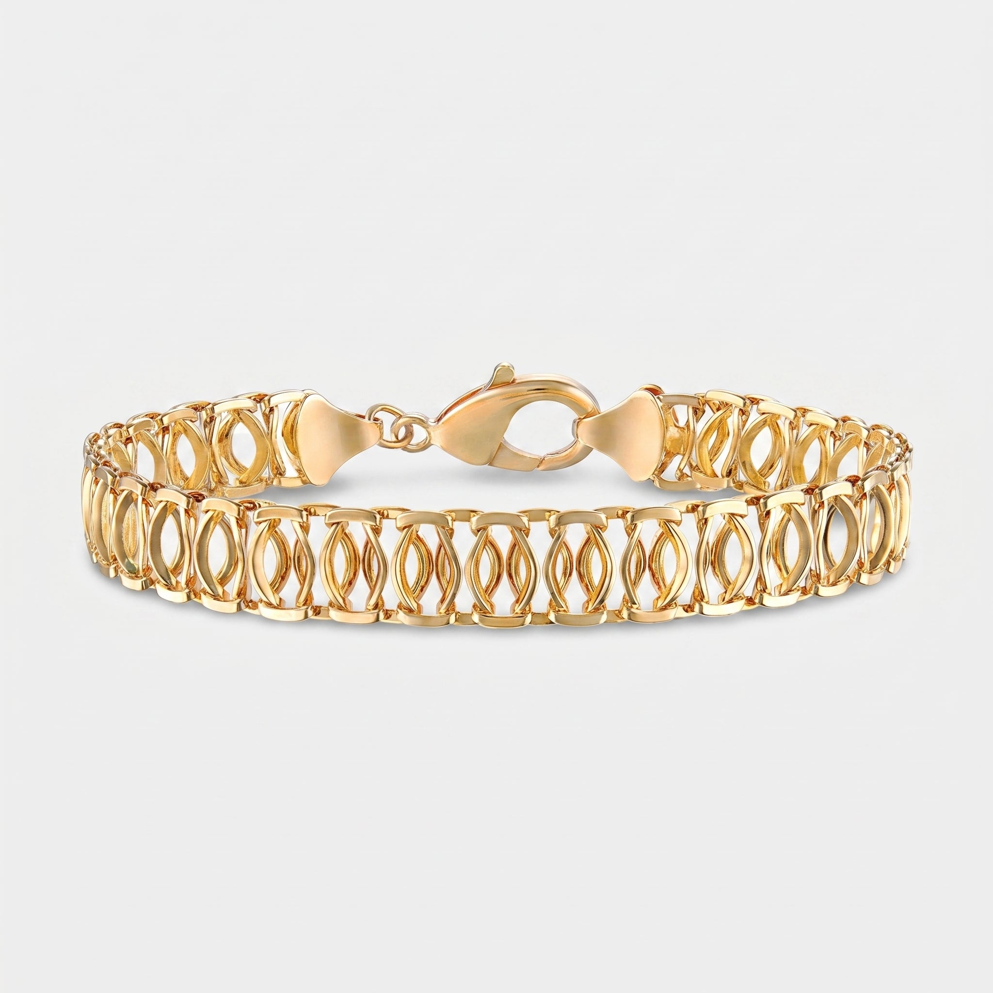 A gold tennis bracelet with an openwork, interlocking link design and a lobster clasp, shown on a light gray background.