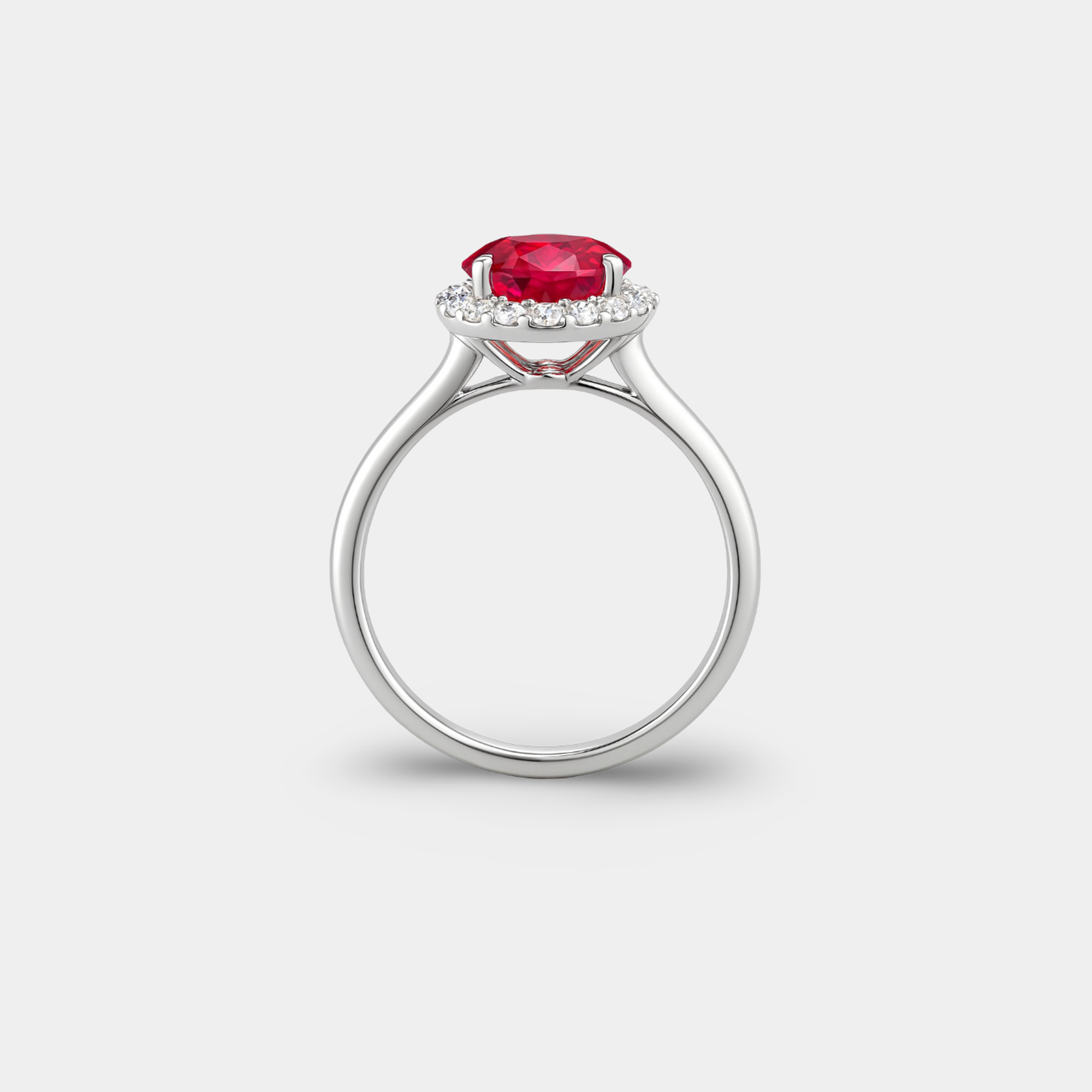 White Gold Oval Ruby & Diamond Halo Ring