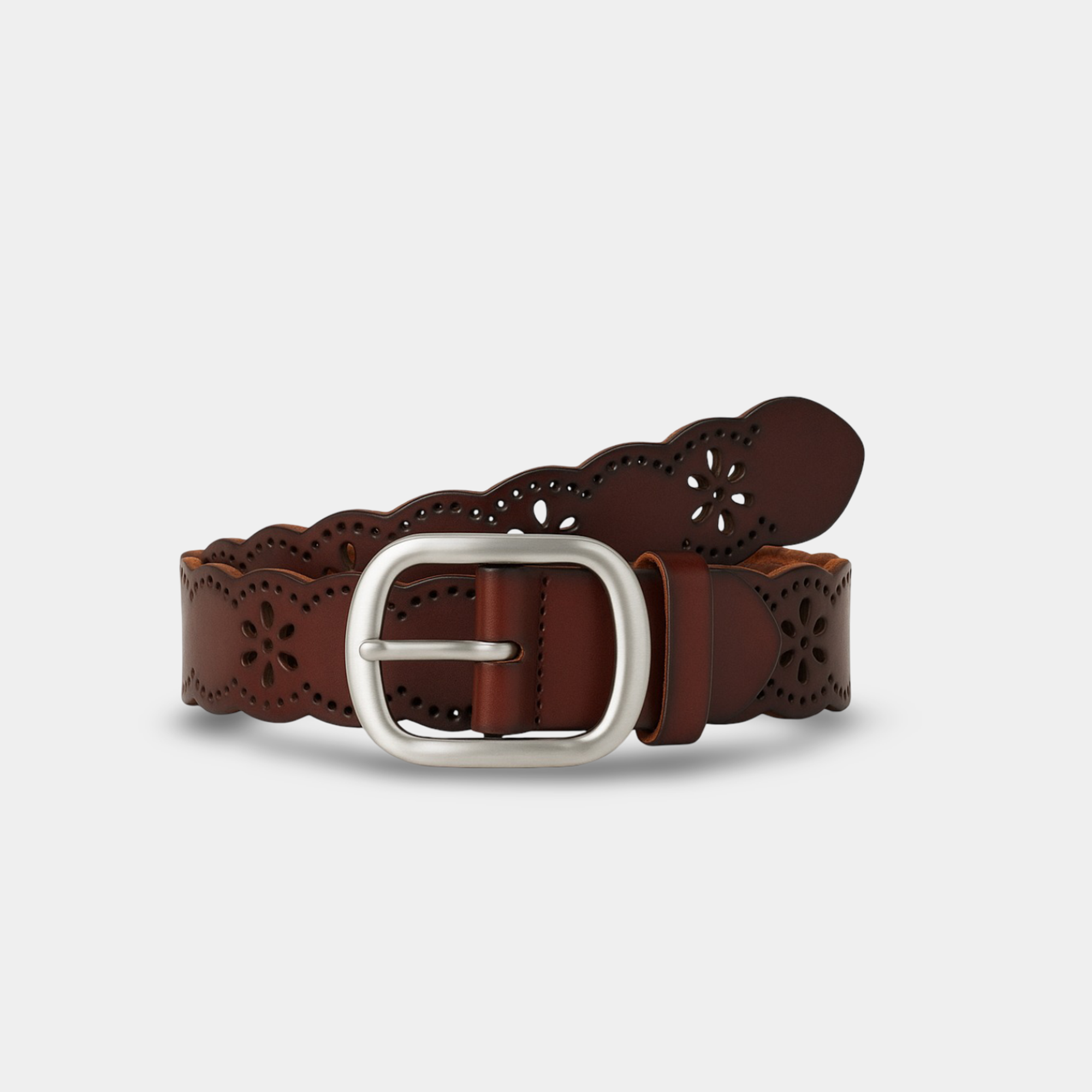 Full view of hollow flower leather belt worn by woman, showcasing handcrafted sculpture and professional styling versatility