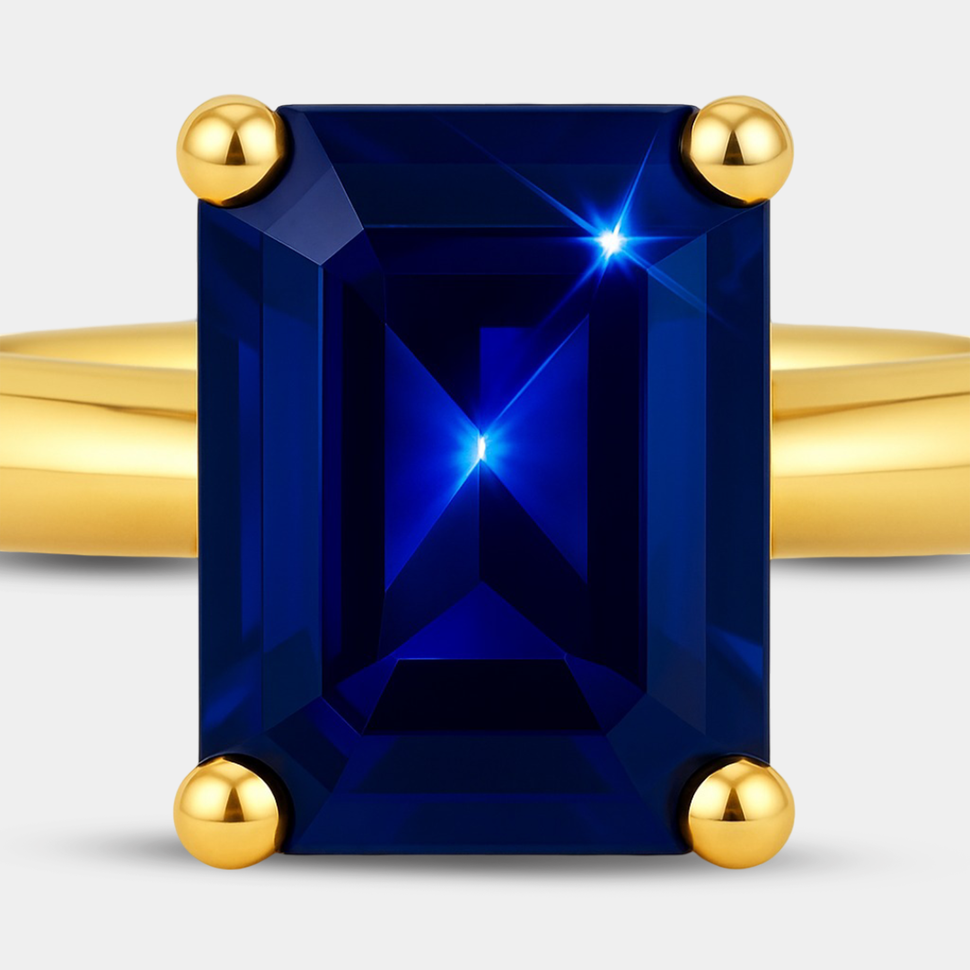 Emerald-Cut Blue Sapphire Solitaire Ring