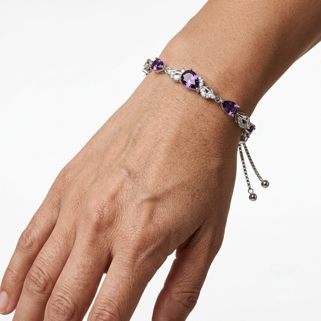 Amethyst teardrop bracelet with CZ accents worn on wrist