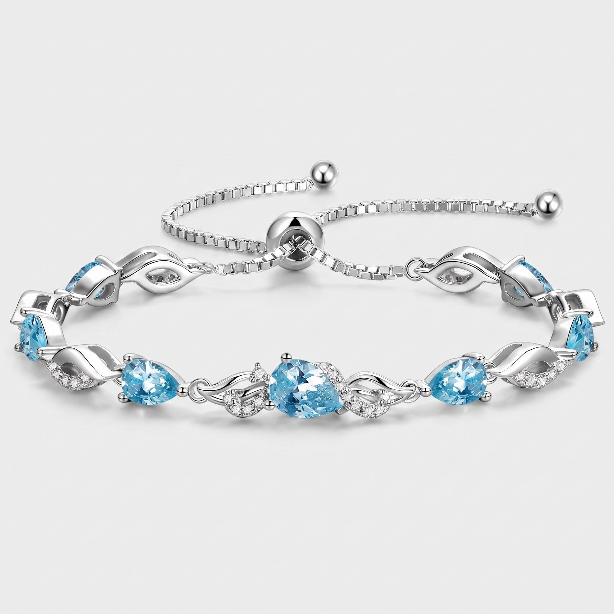 Aquamarine teardrop tennis bracelet in sterling silver with adjustable bolo clasp