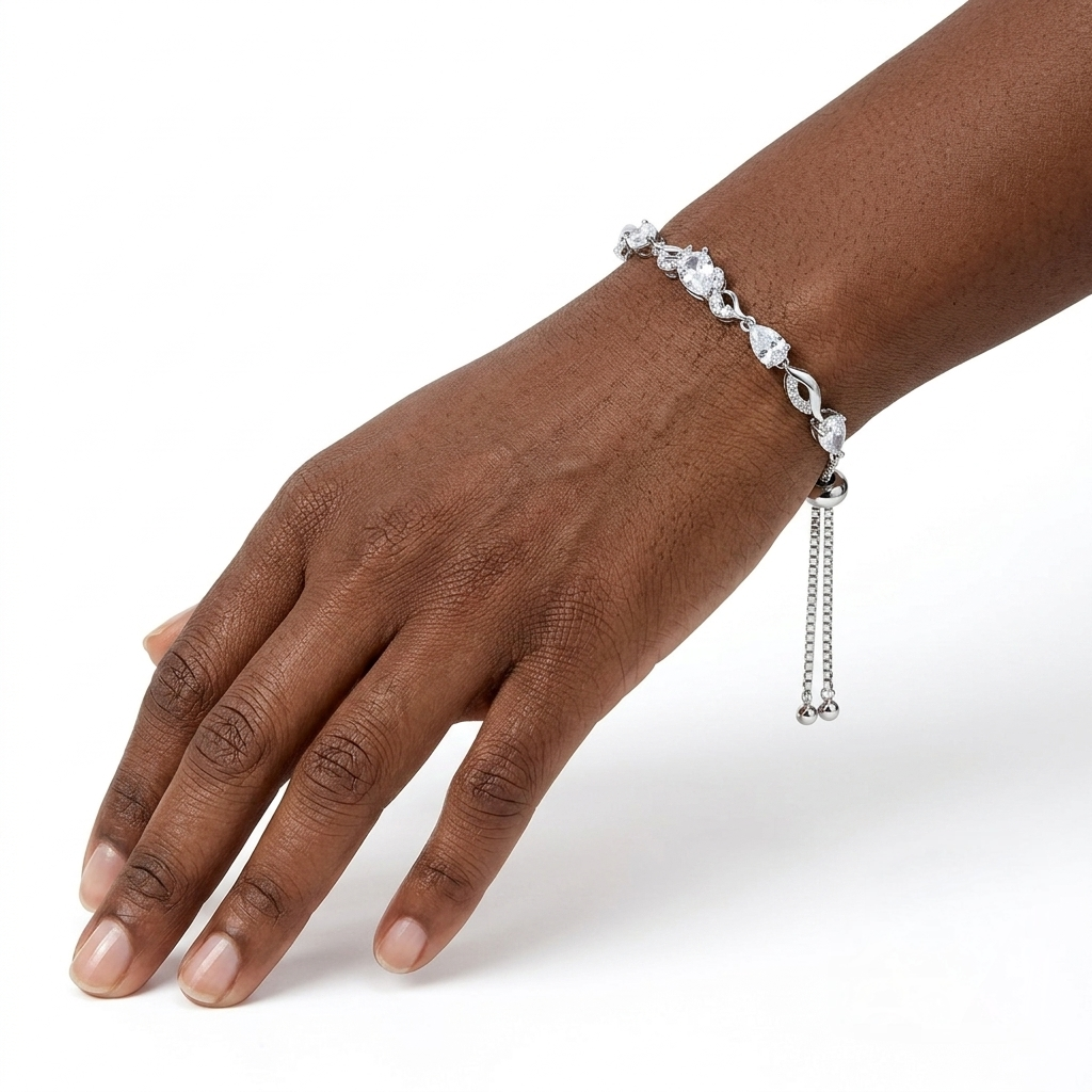 CZ tennis bracelet worn on the wrist, angled close-up view