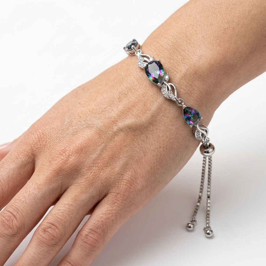 Woman wearing alexandrite tennis bracelet on her wrist near her chin
