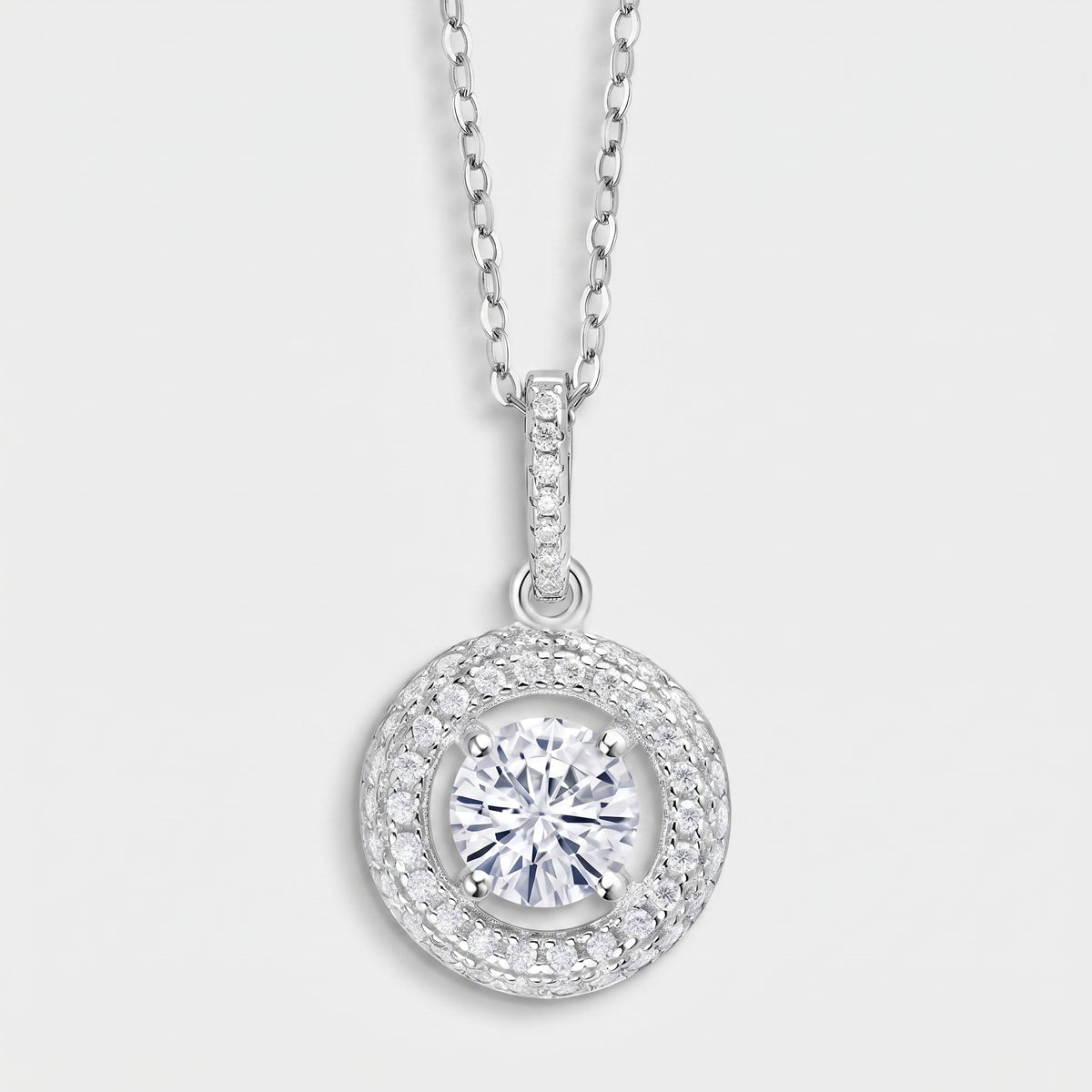 Round double halo pendant necklace with a 6mm white moissanite center stone in sterling silver