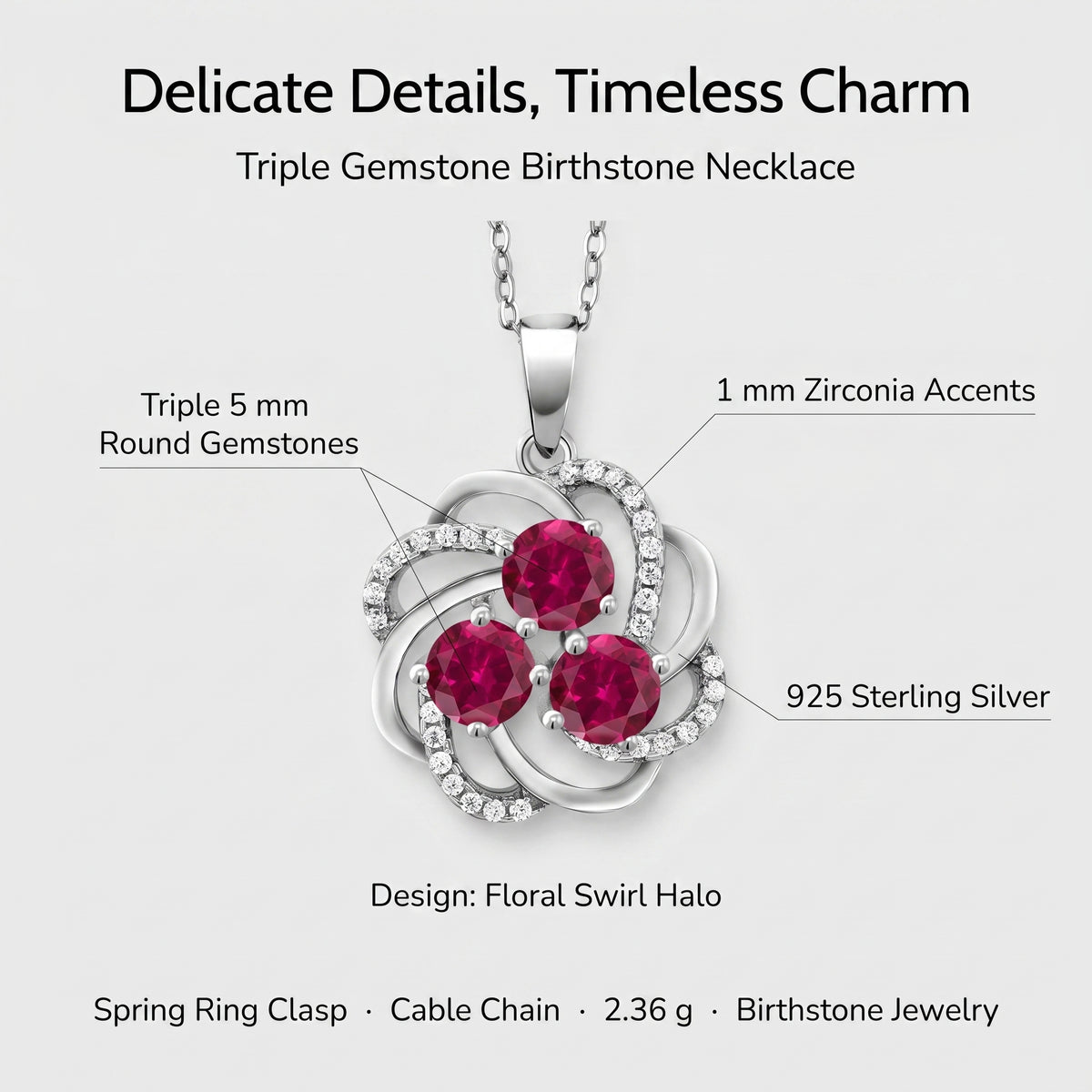 Ruby three stone necklace details: 5mm round created rubies, 1mm cubic zirconia accents, 925 sterling silver, floral swirl halo