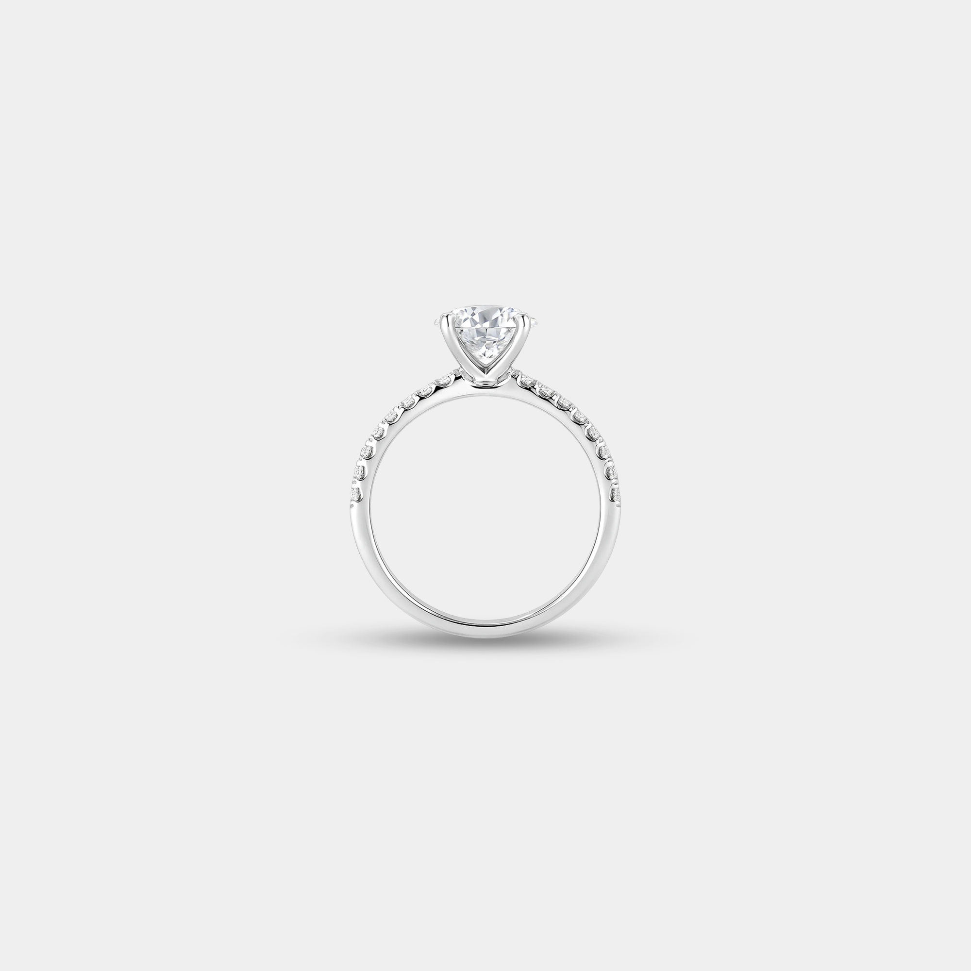 Basket cathedral moissanite engagement ring worn on a woman's hand showing elevated stone and 14K gold band