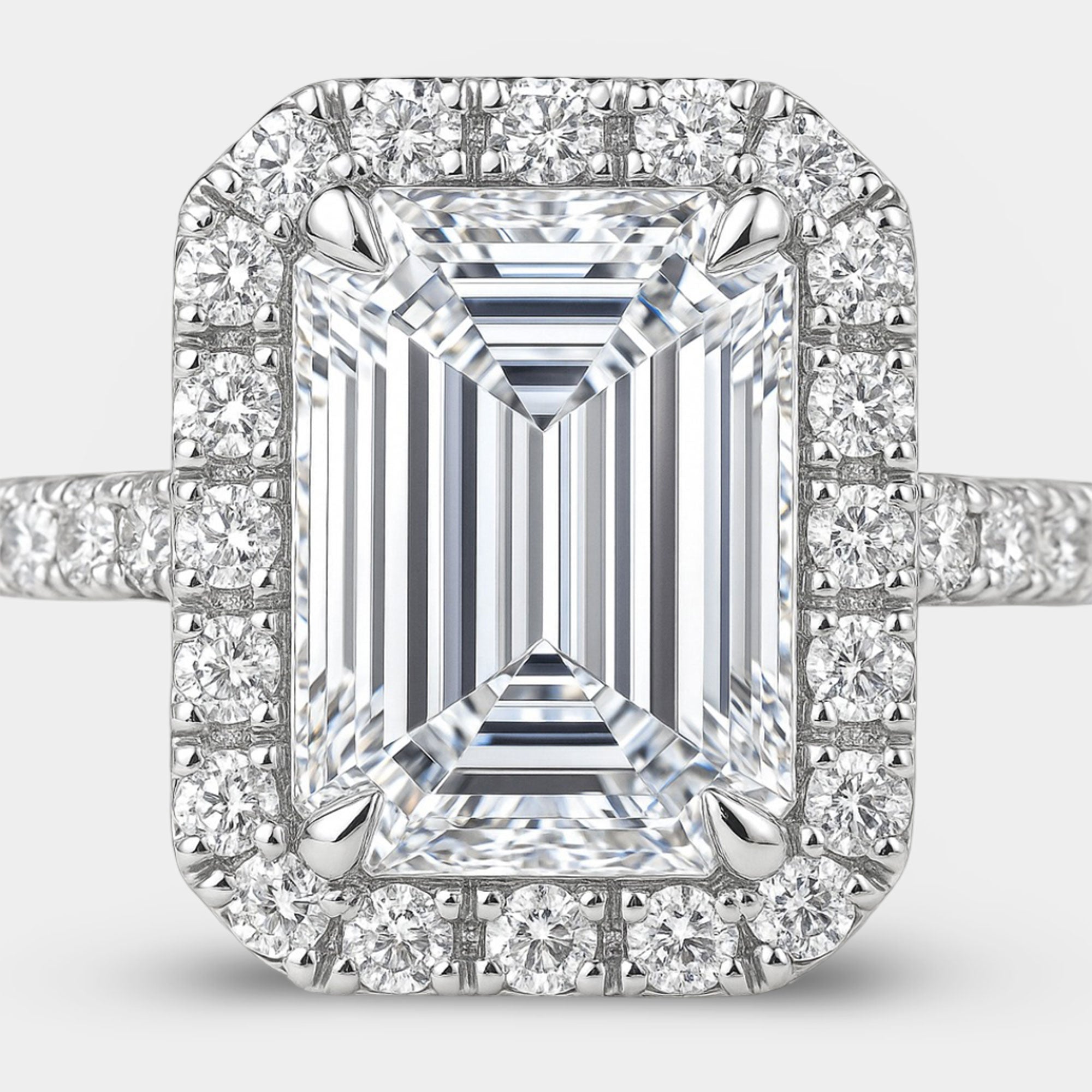 emerald cut moissanite halo engagement ring angle view 2 from MH Elegance luxury wedding rings collection