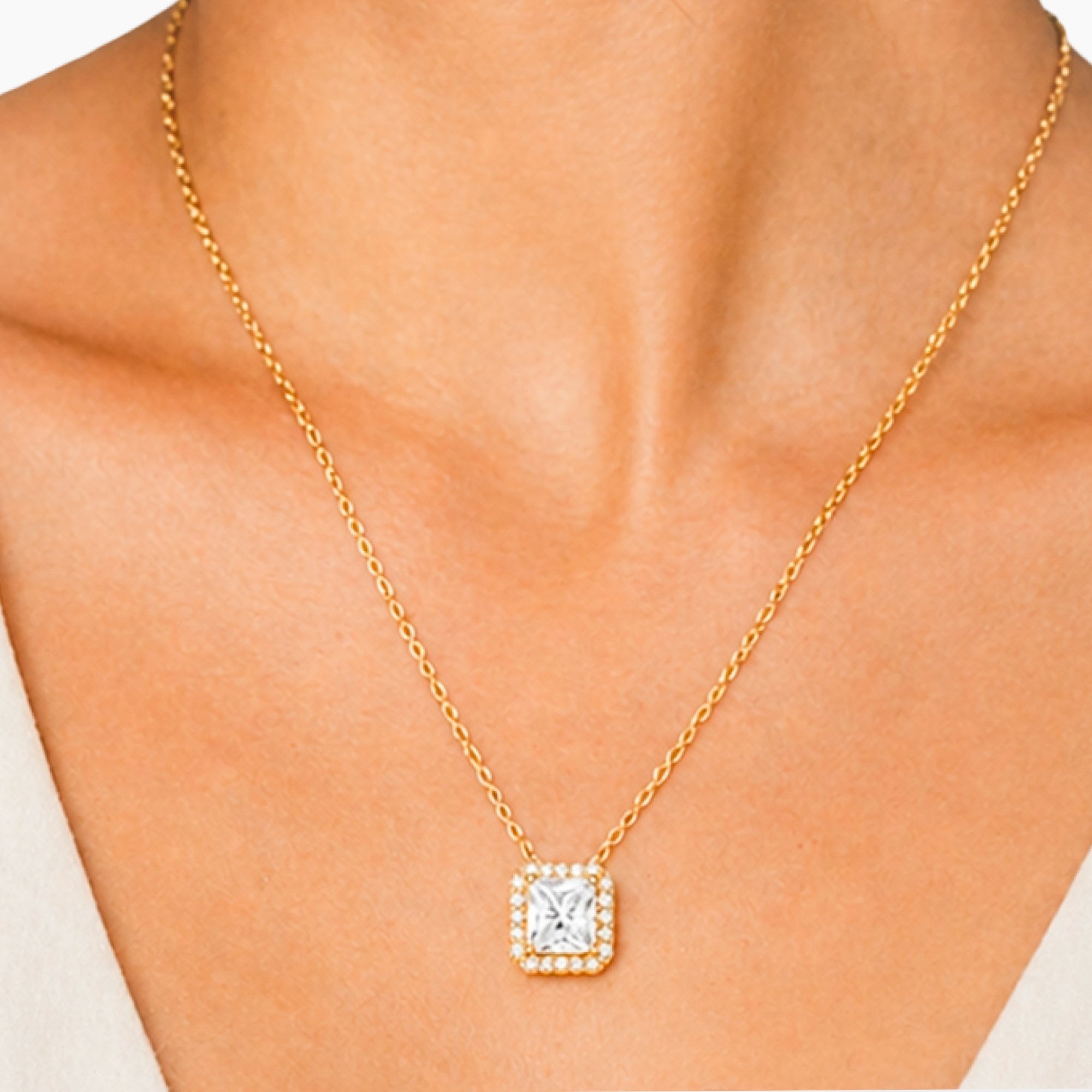 Princess cut center stone gold halo necklace