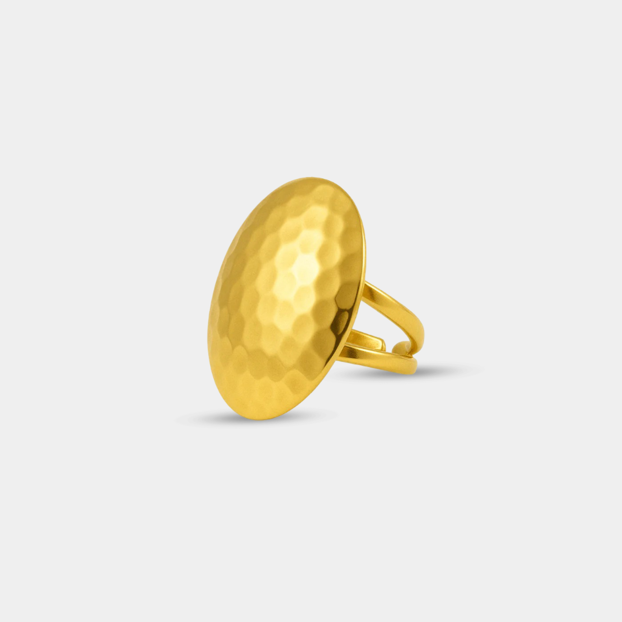 Side profile of bold textured gold dome ring showing dome height, band width and sculptural 14K gold form