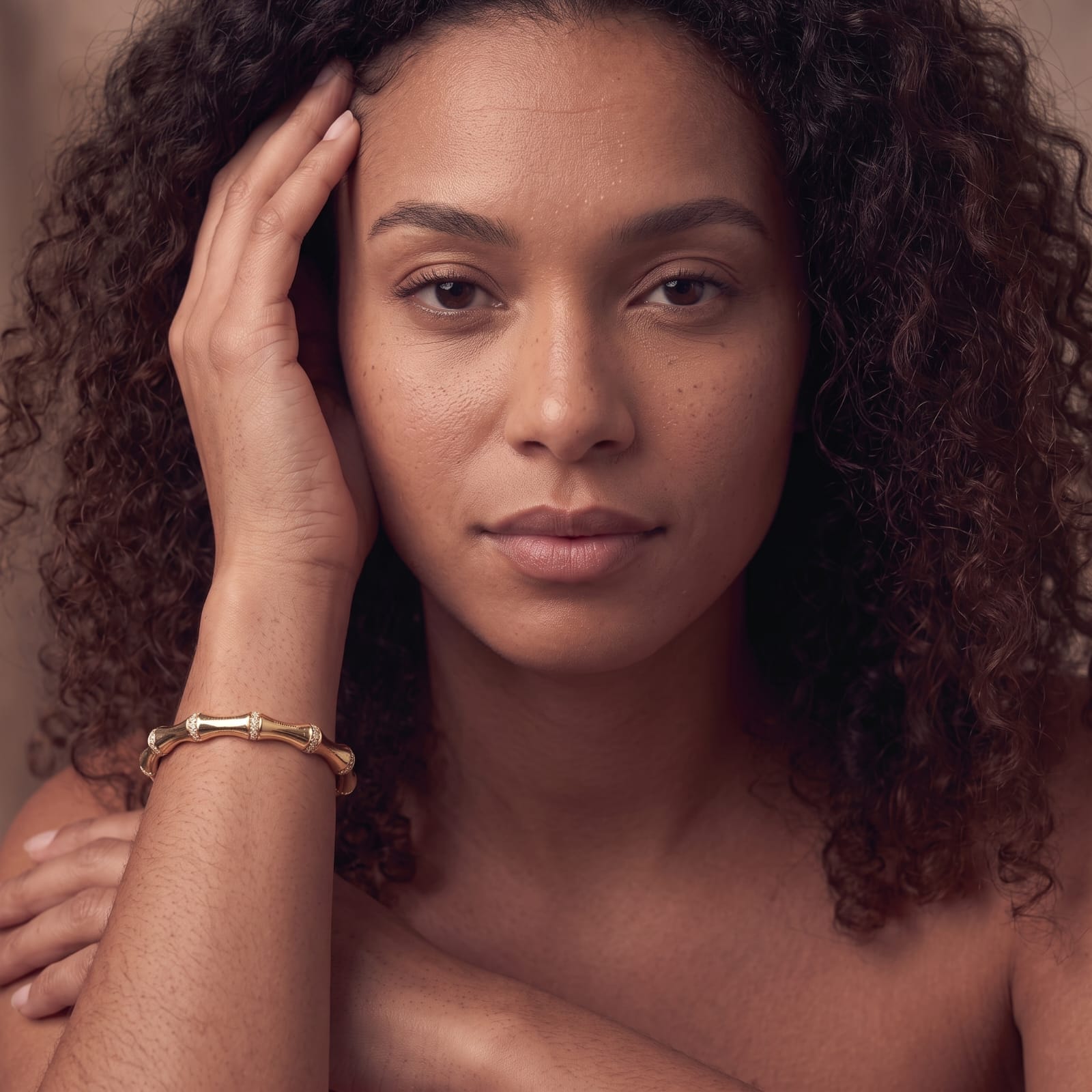 Close view of the MH Elegance gold plated bamboo bangle bracelet with rounded ball ends