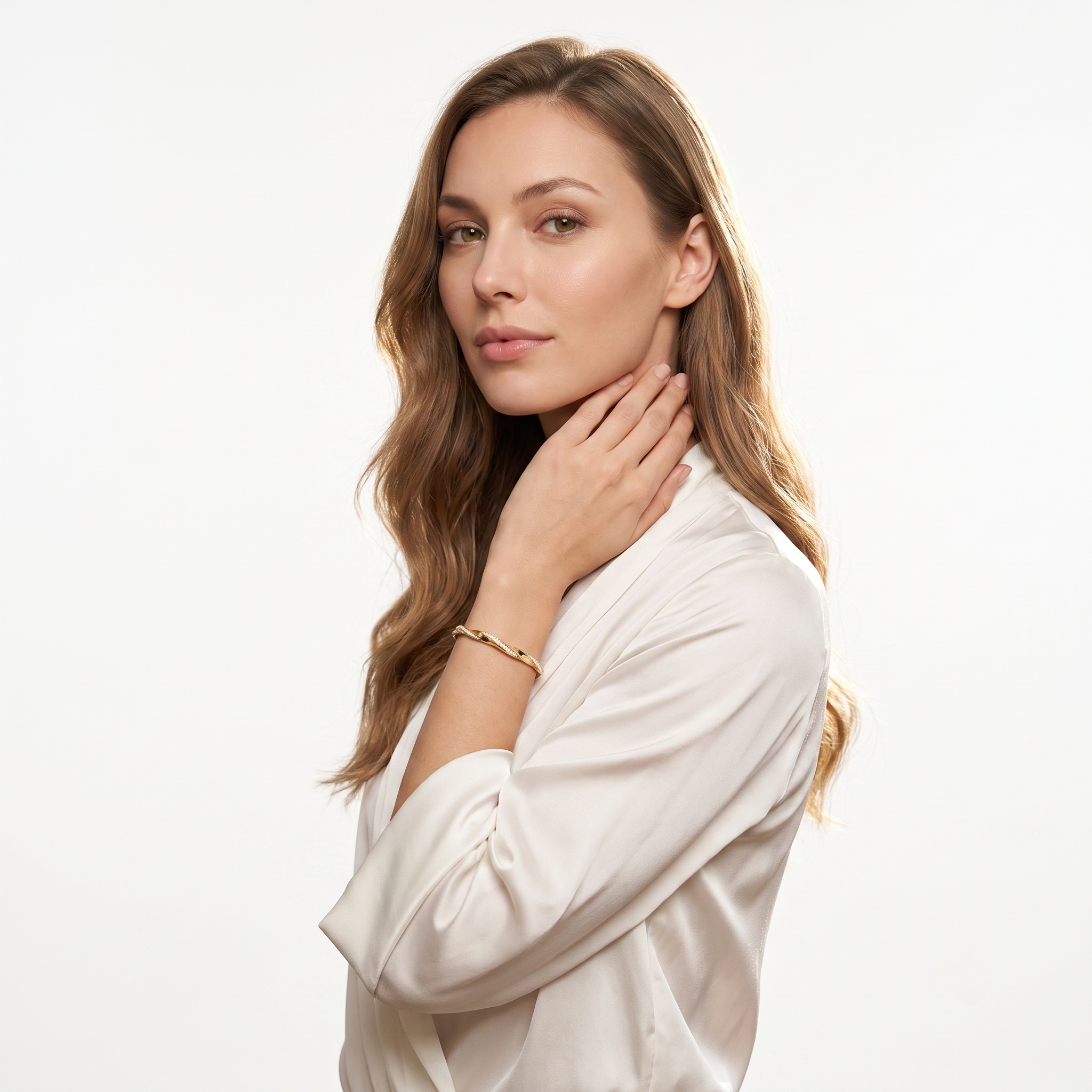 Woman styling the gold plated moissanite twisted bangle bracelet, side profile