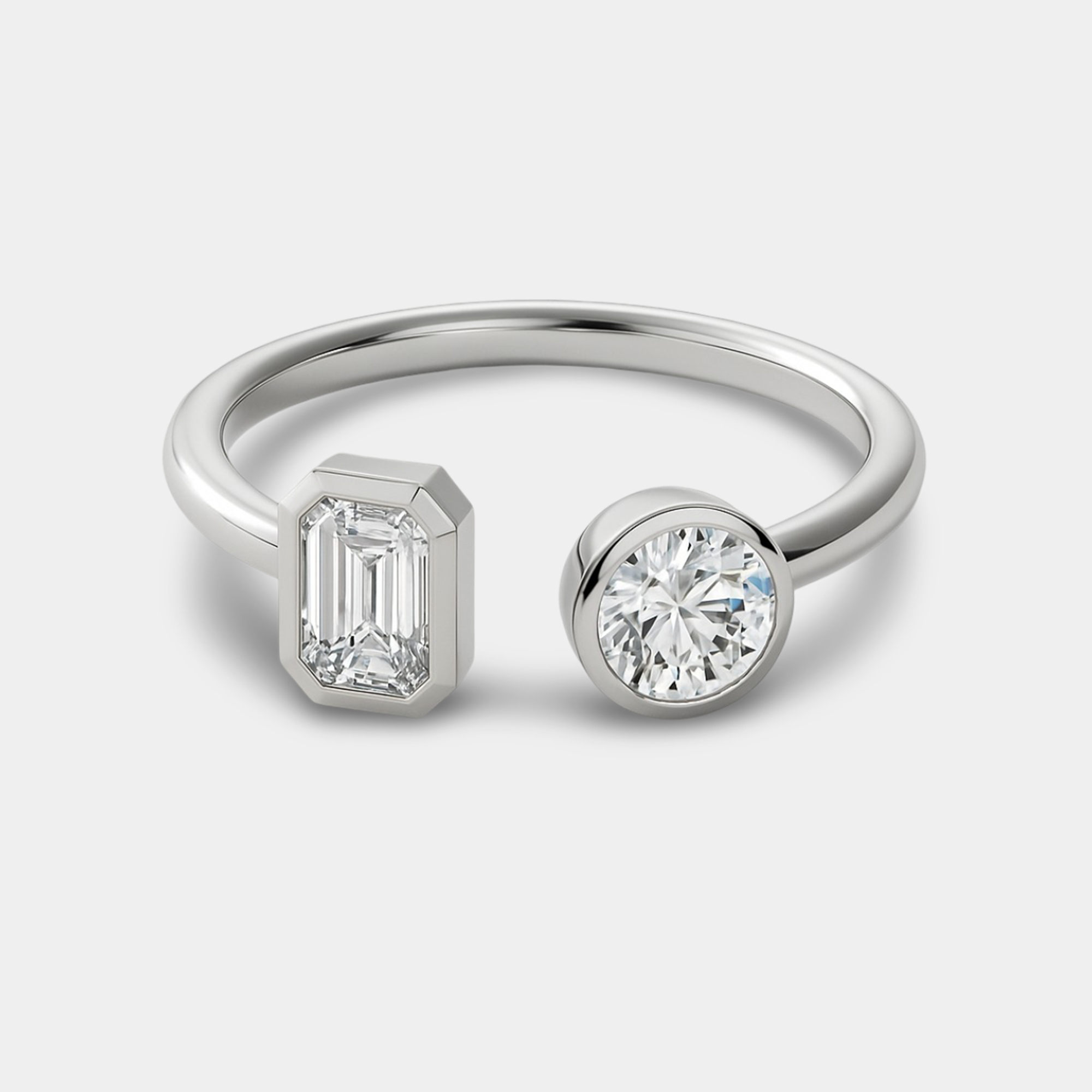 round and emerald diamond engagement ring main display from MH Elegance luxury wedding rings collection