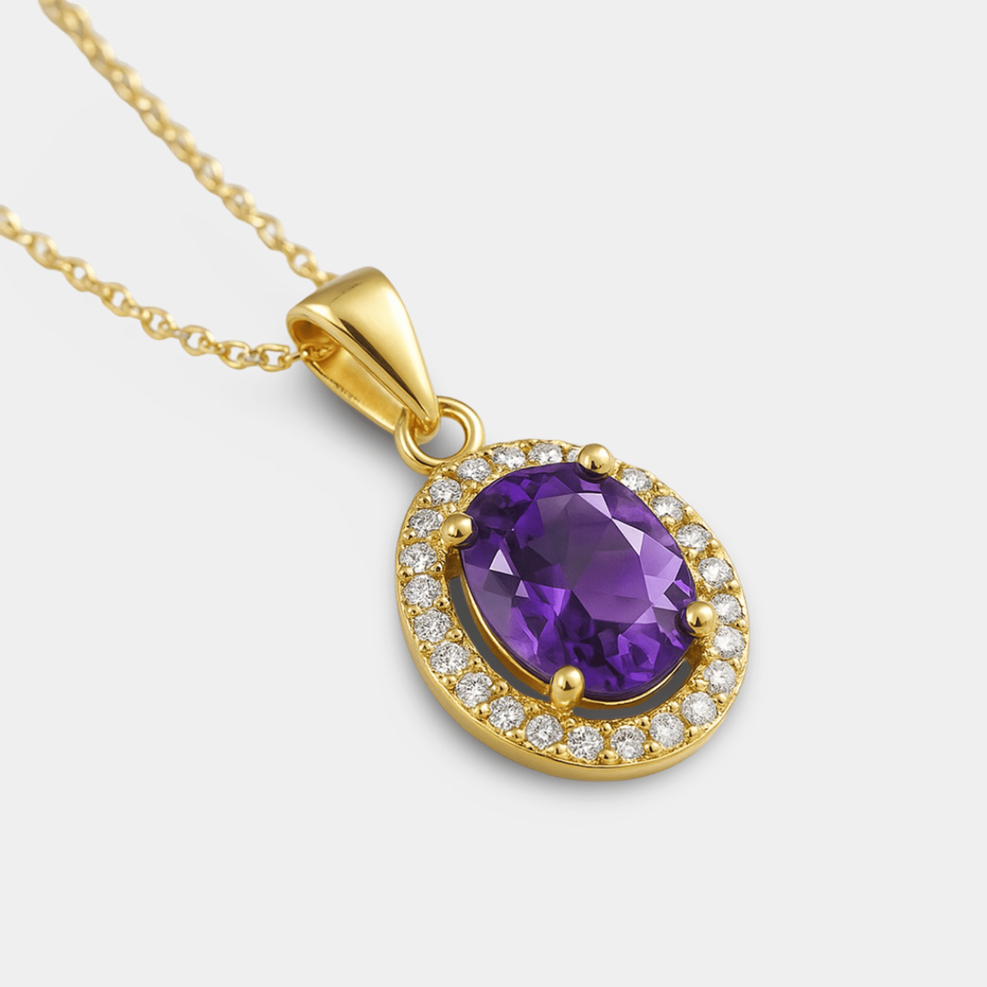 Angled view of the amethyst halo pendant showing the gold bail and yellow gold plated setting
