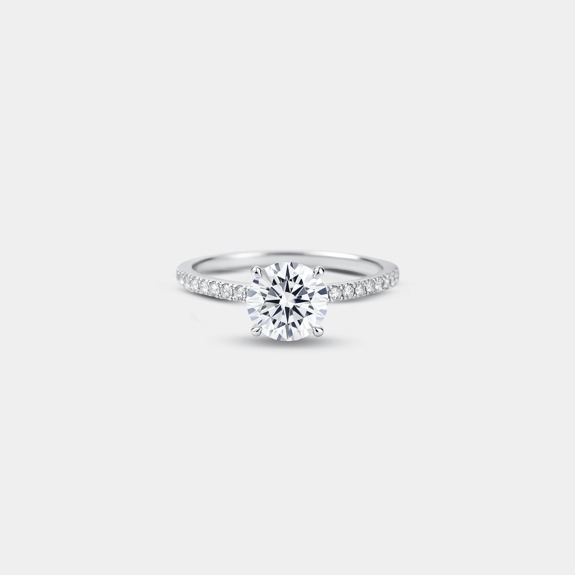 Side view of the basket cathedral moissanite engagement ring in sterling silver showing the elevated center-stone profile