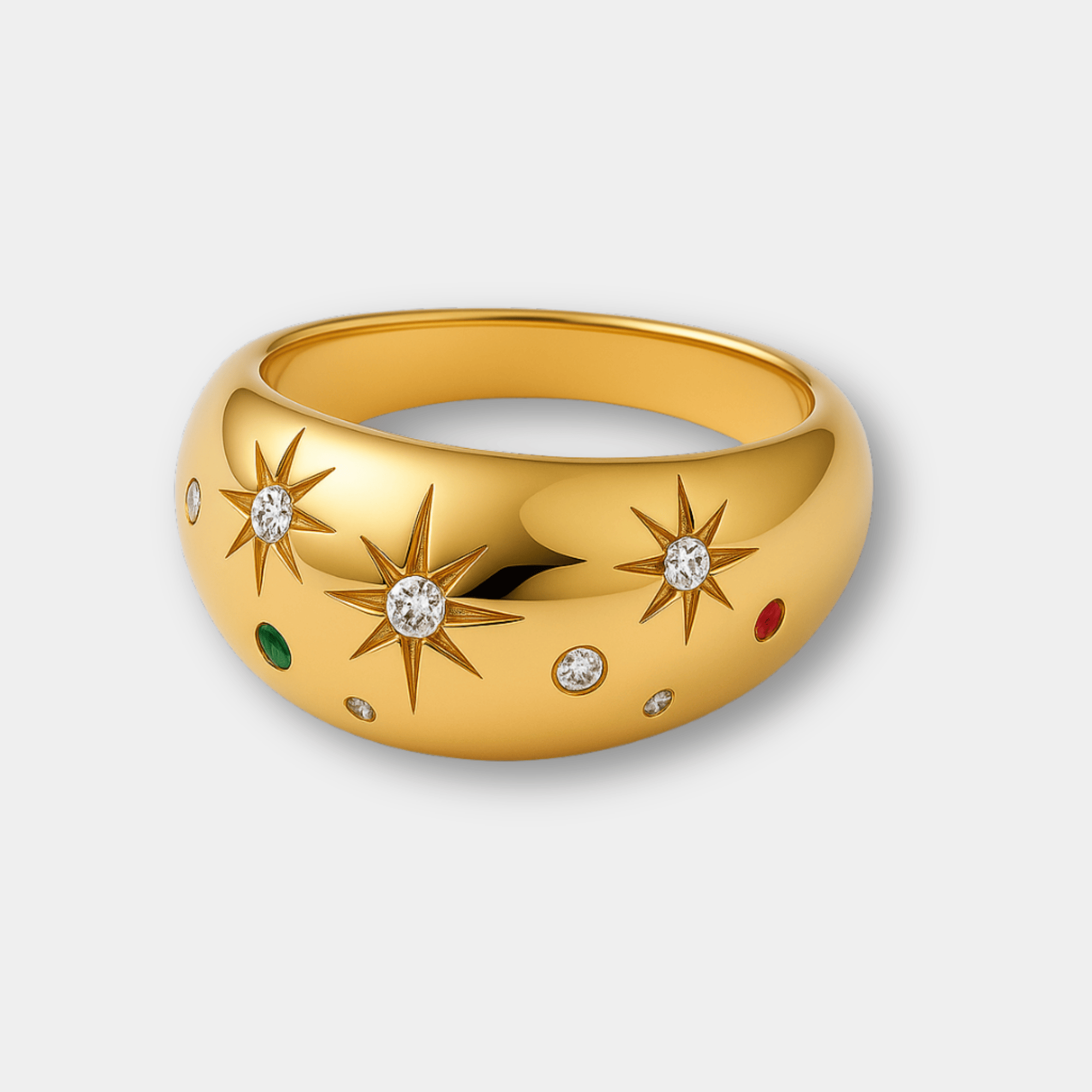 Front angle of the gold celestial starburst statement ring highlighting the domed band and triple star design