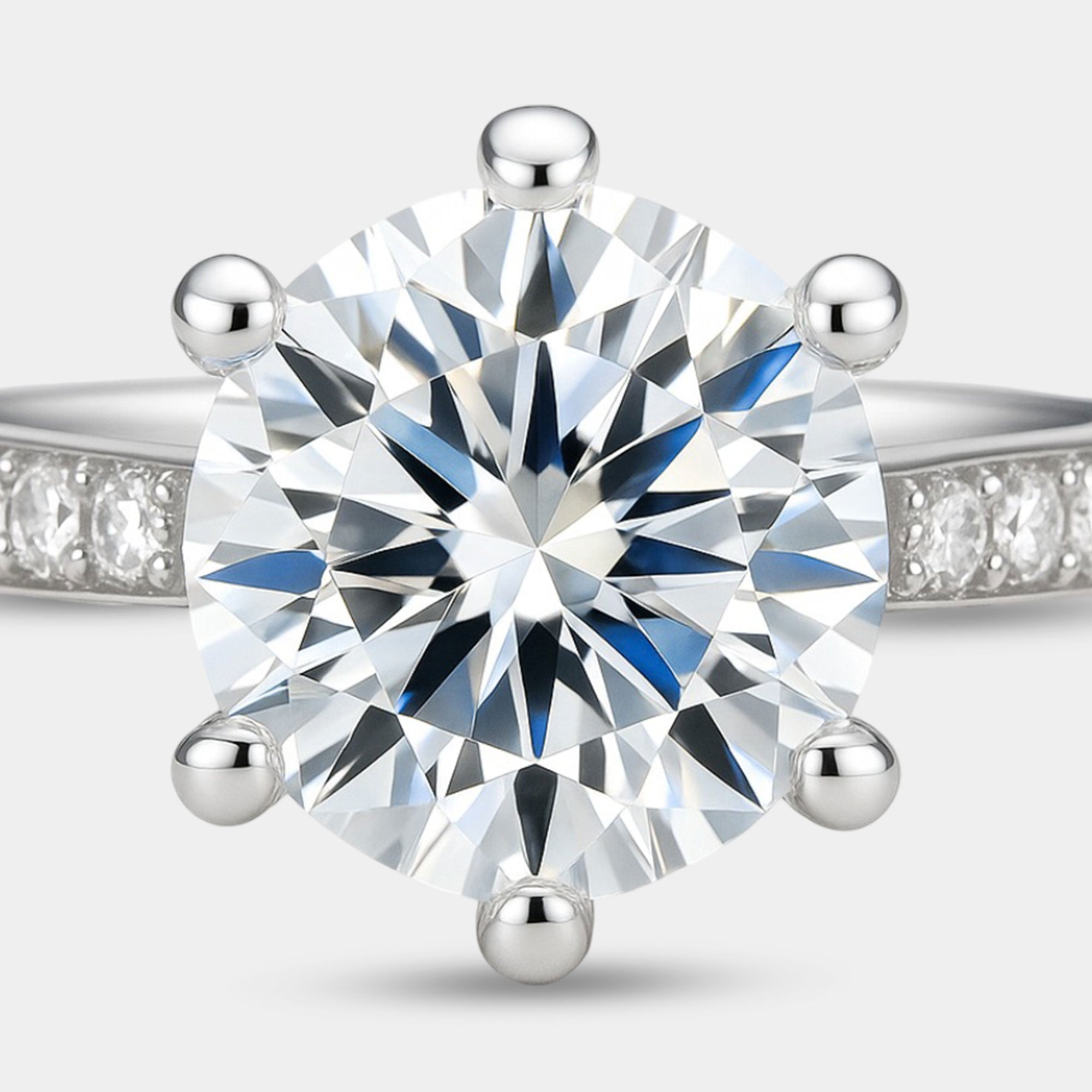 Side angle view of the sterling silver halo moissanite engagement ring