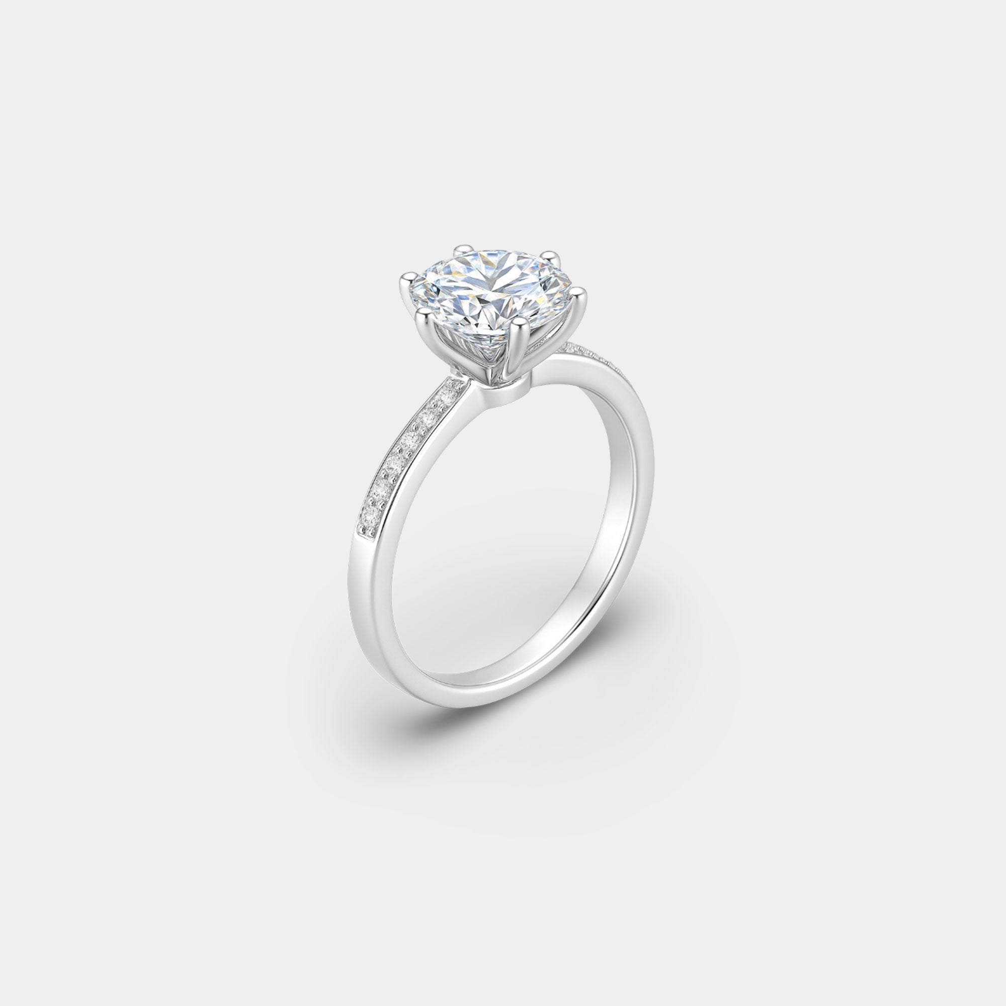 Woman wearing the halo round cut moissanite engagement ring on her hand
