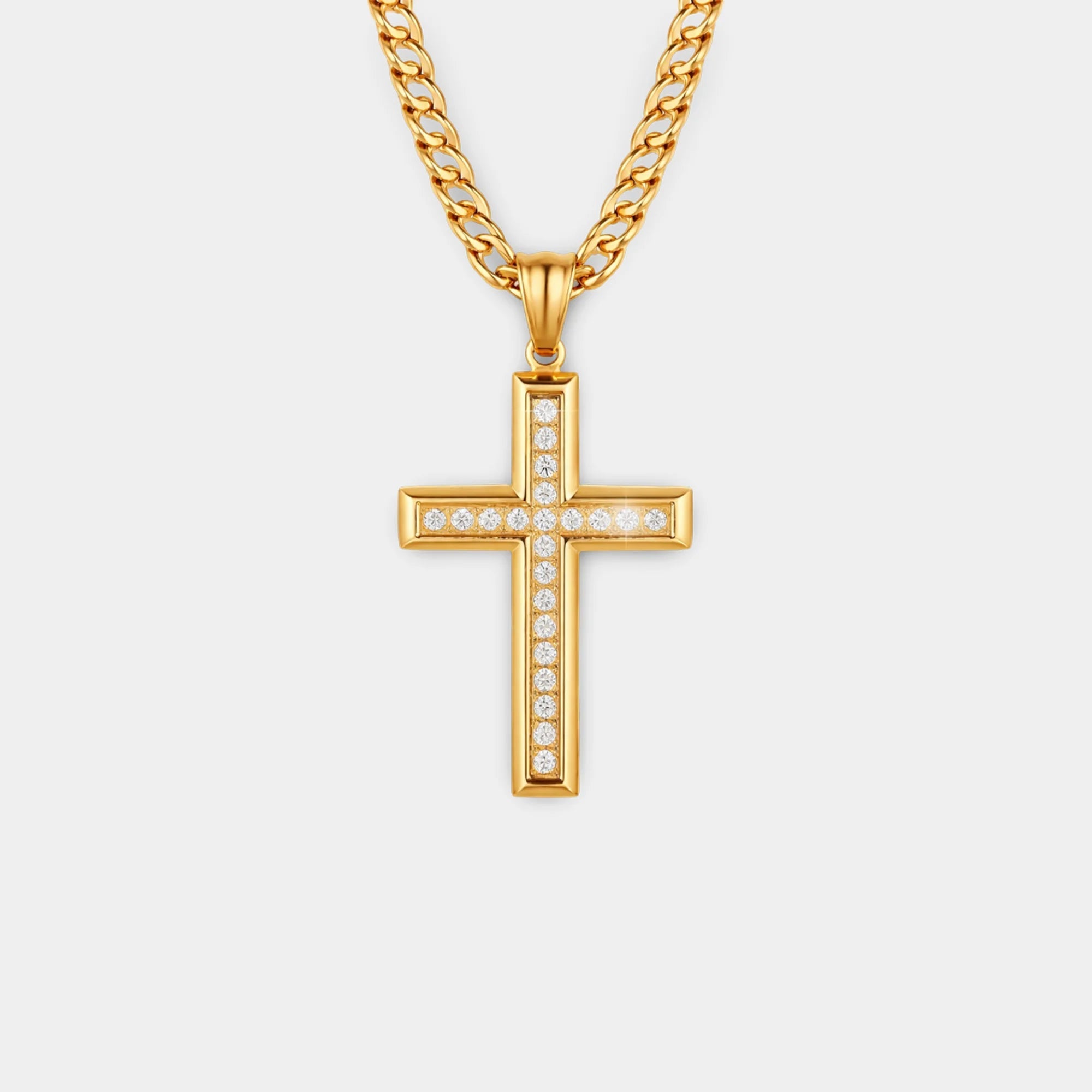 CZ cross Figaro chain necklace in 24K gold-plated stainless steel showing the sparkling cubic zirconia cross pendant