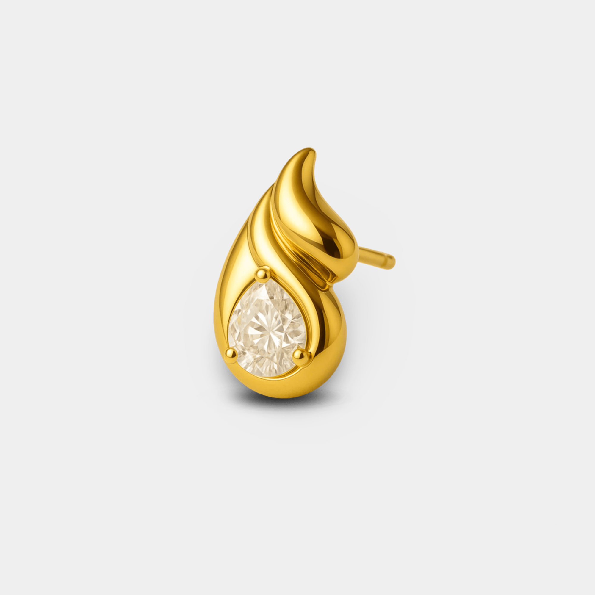 Close-up of a double teardrop stud earring with two sparkling cubic zirconia stones.