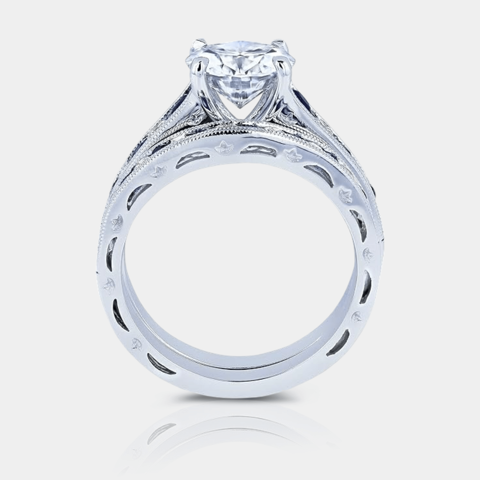 Side view of the CZ halo bridal set showing the matching wedding band and engagement ring together