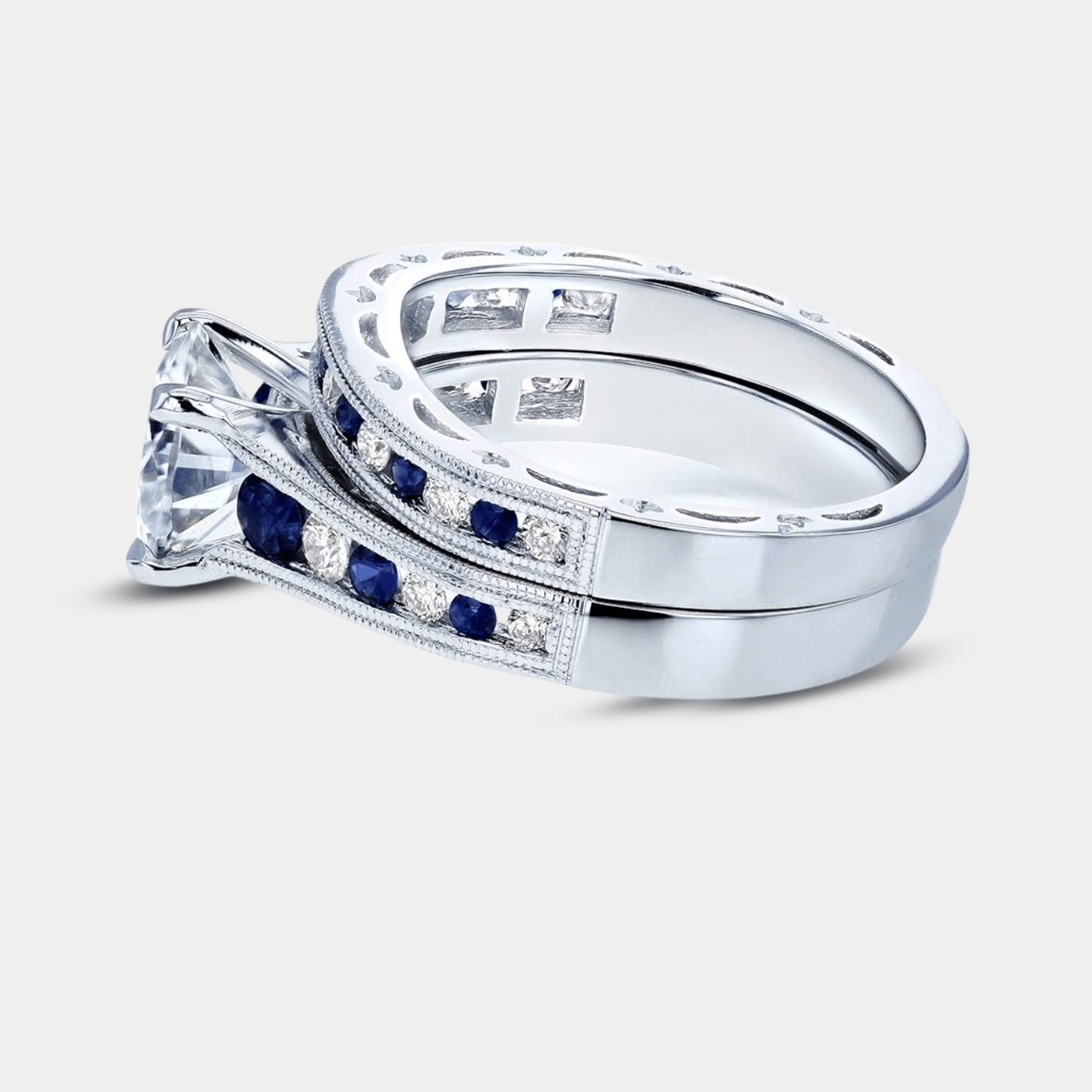 Cubic zirconia halo bridal set worn on a woman's hand showing the sparkling round stones