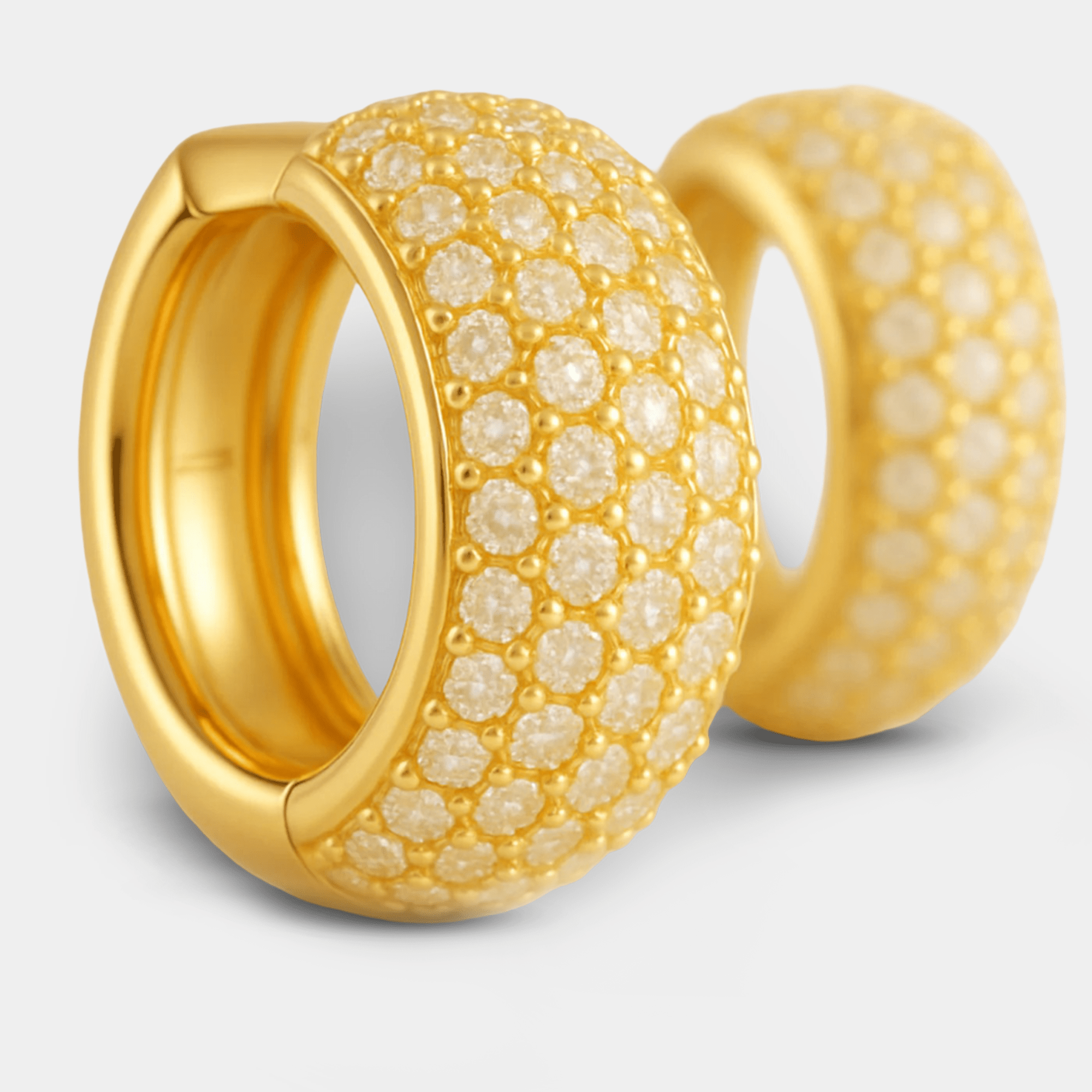 Macro close-up of pavé cubic zirconia brick pattern on GlamBrick 18K gold plated hoop earrings