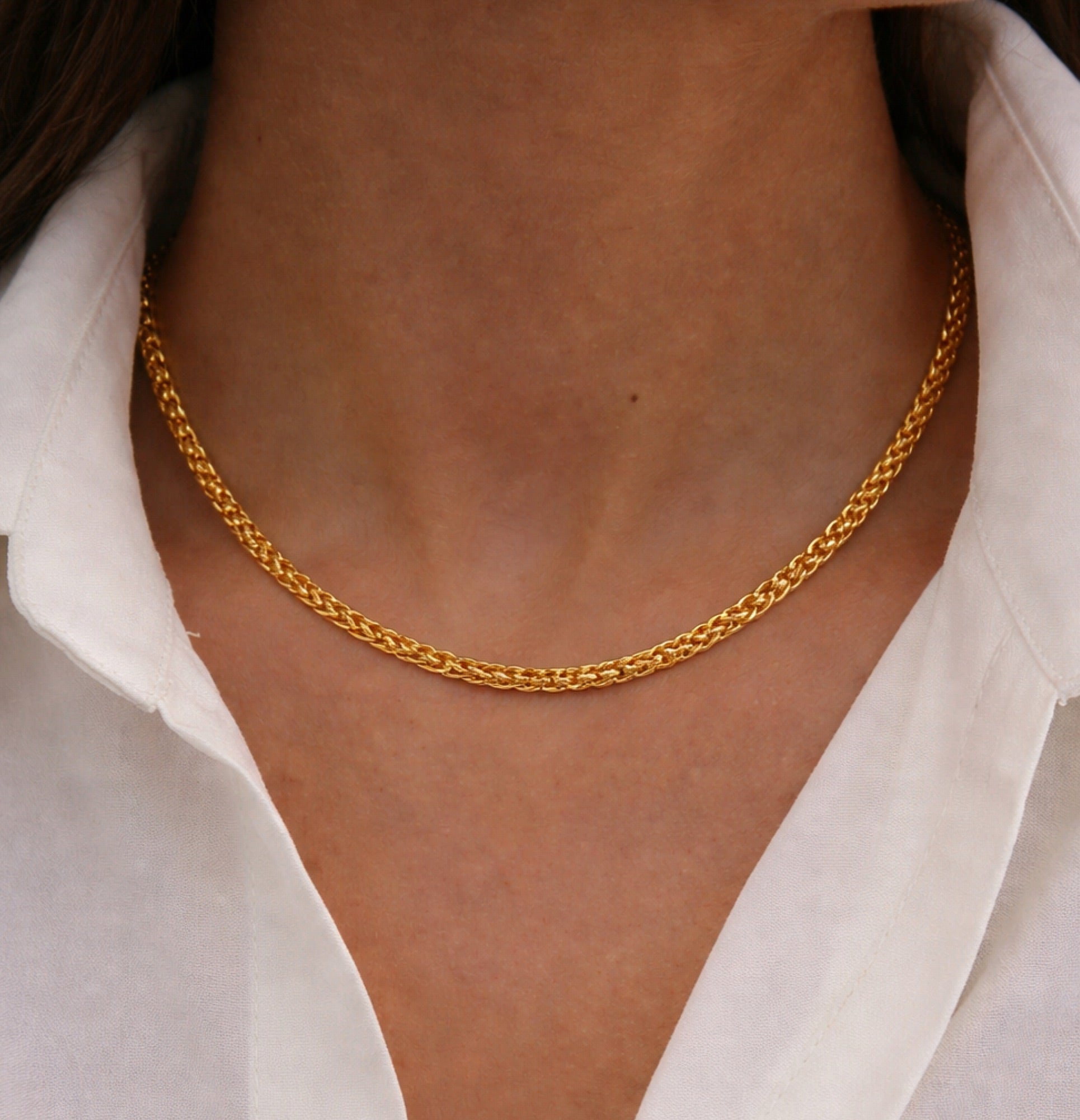 Close-up of the 3mm woven wheat pattern on the 14K gold plated chain by MH Elegance