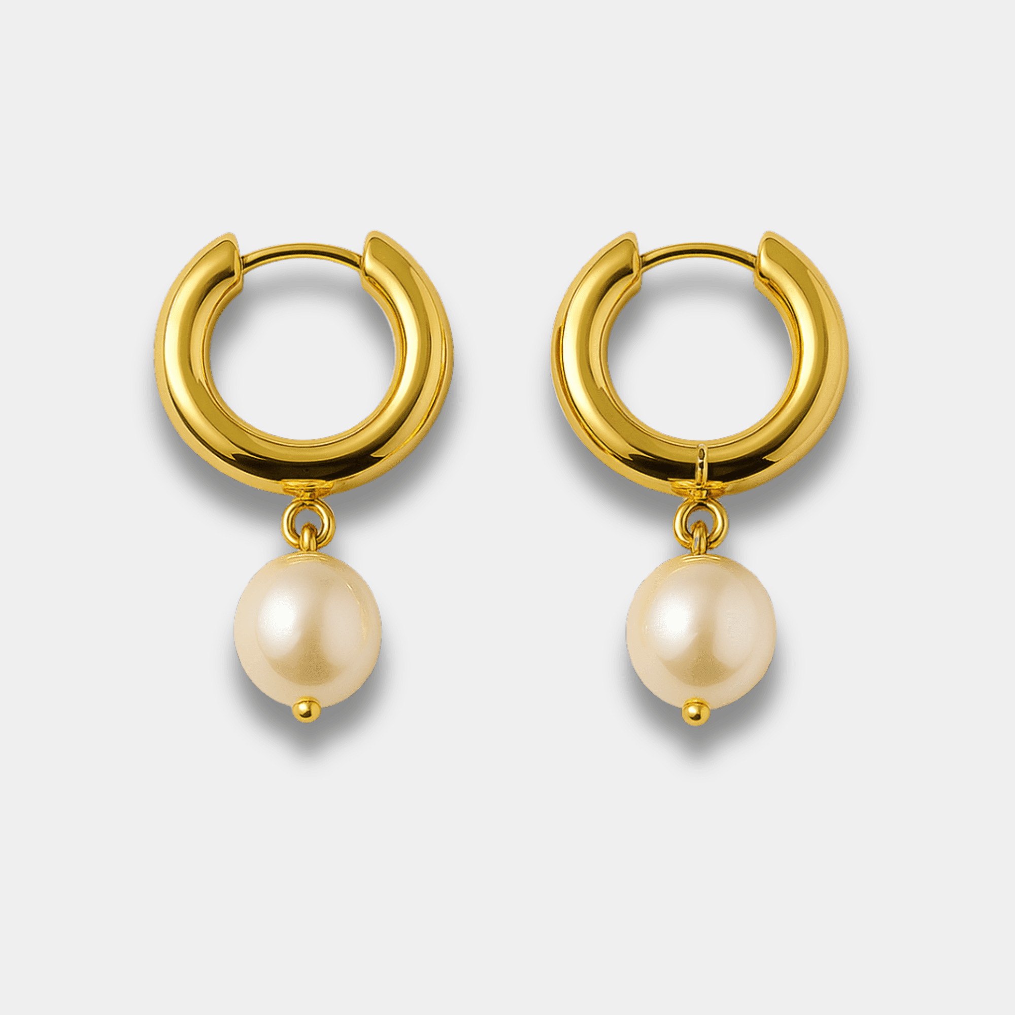 Goldie Pearl gold hoop earrings, front view, freshwater pearl on an 18K gold plated stainless steel hoop