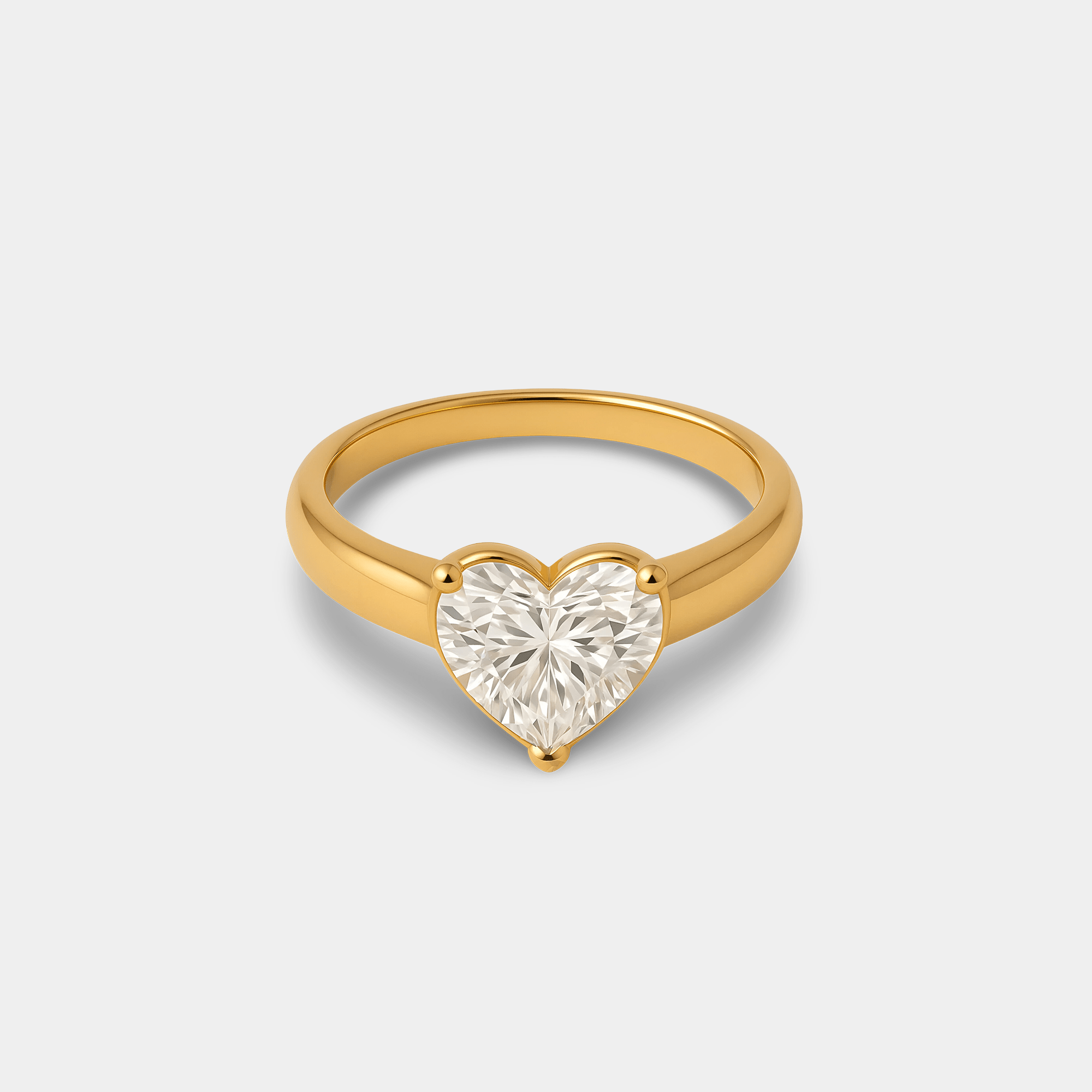 Heart shaped zircon ring in waterproof 14K gold plated stainless steel, front angled view of the heart-cut CZ stone