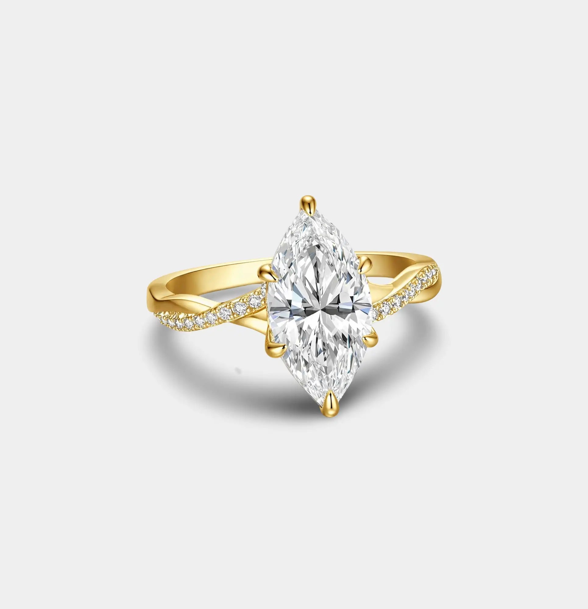 White gold twisted band engagement ring with a marquise moissanite stone, detail view
