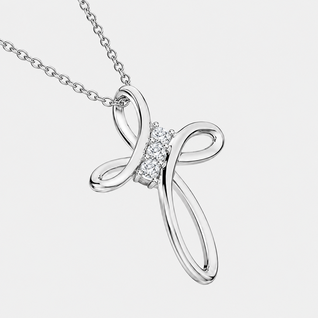 Close-up of the round D VVS1 moissanite on the infinity cross pendant