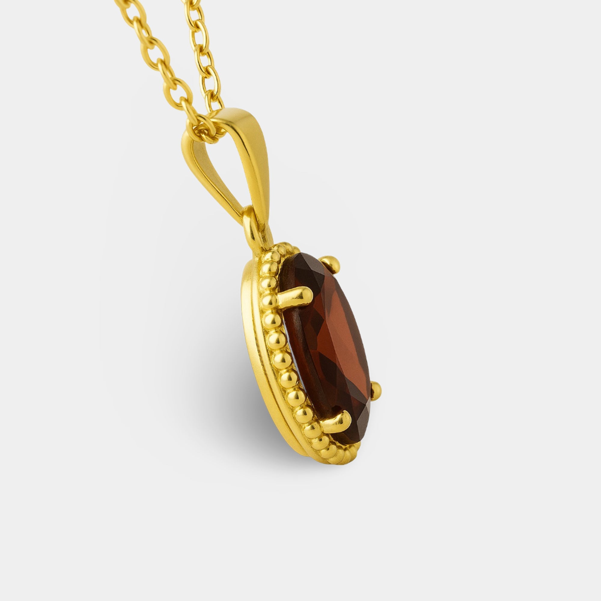 Sterling silver garnet pendant necklace with 18-inch chain and spring ring clasp