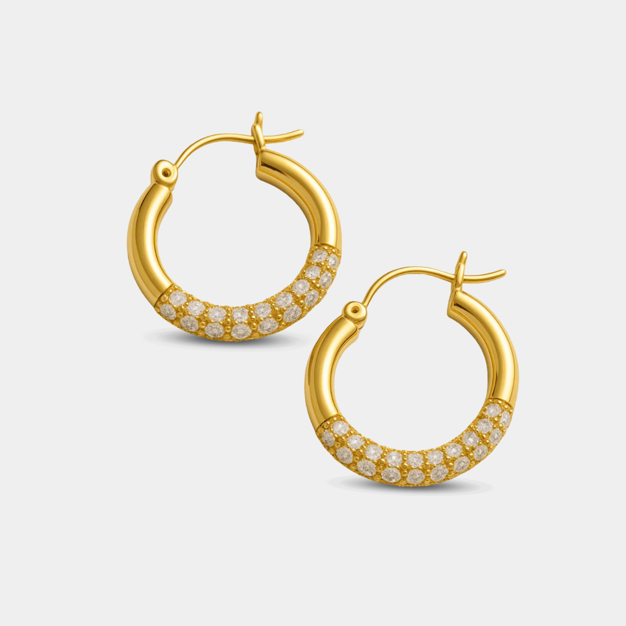 Pair of waterproof gold rhinestone hoop earrings shown at a three-quarter angle