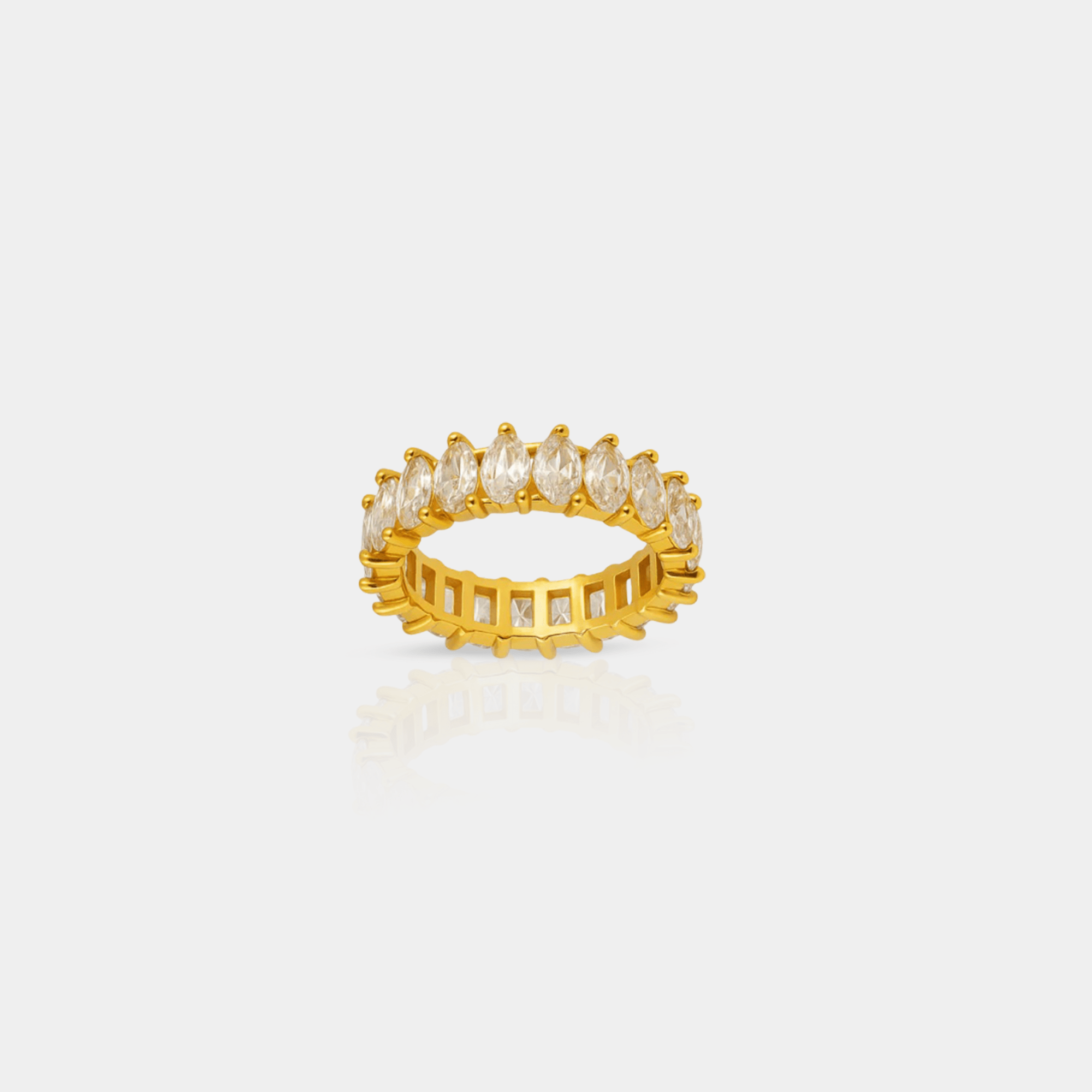 Side profile of marquise zircon ring showing gold PVD coated stainless steel band and faceted marquise stone