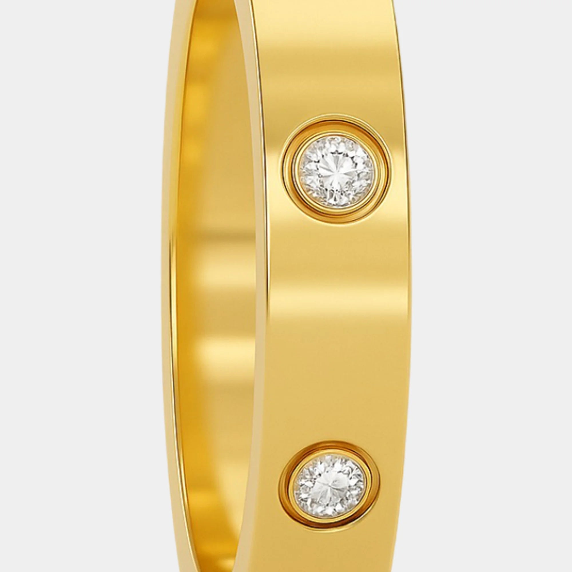 Close-up of MH Elegance 18K gold-plated stainless steel promise band with round cut cubic zirconia stone accents