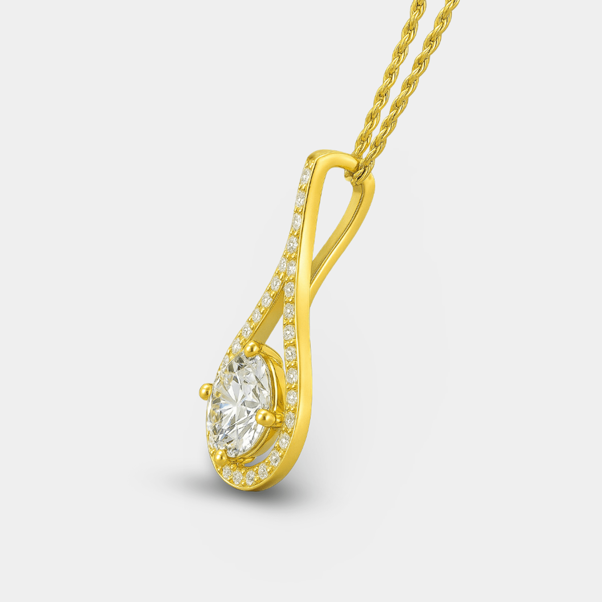 Side view of the round moissanite pendant showing the gold vermeil setting