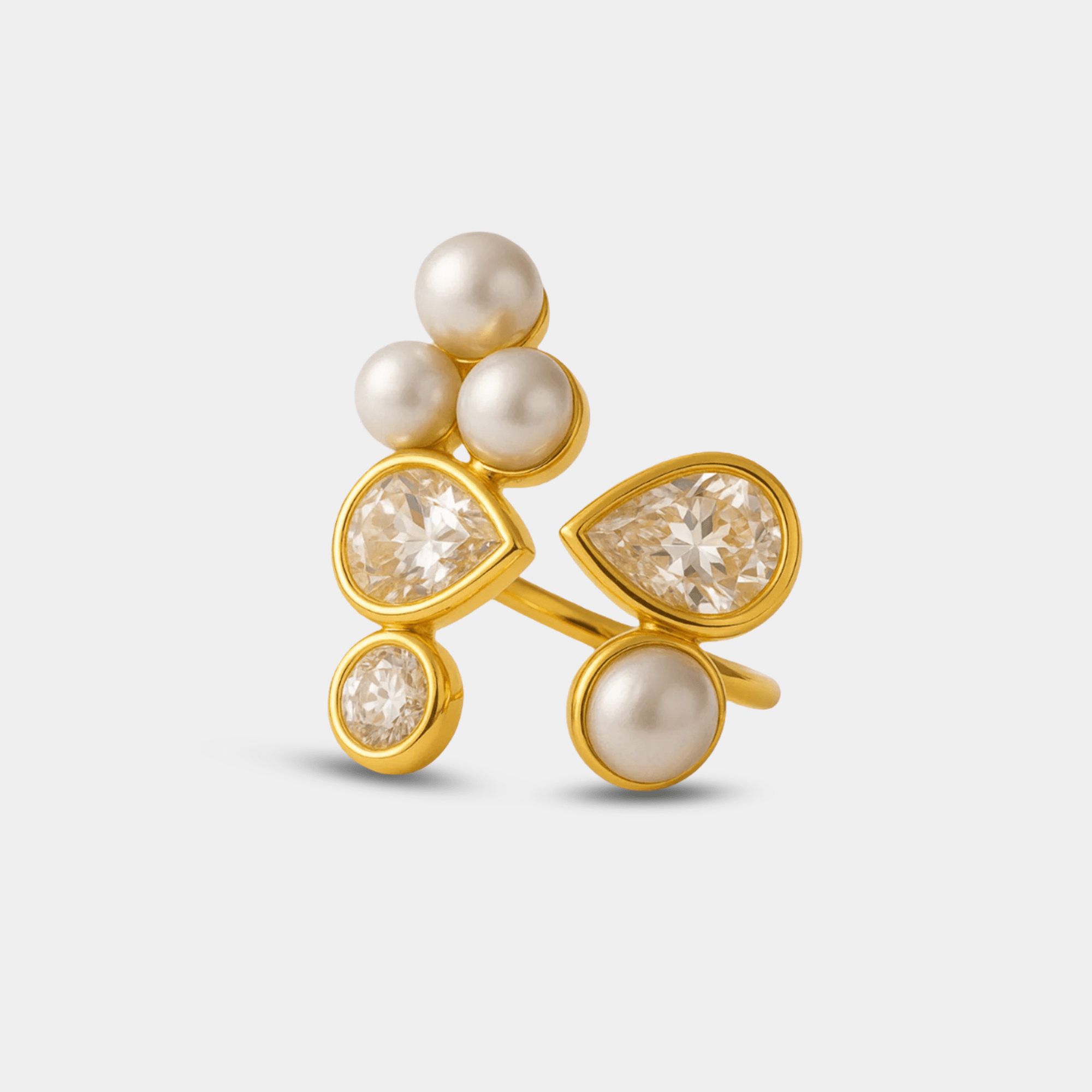 Close-up of the adjustable 18K gold plated open band with pearl and clear zircon accents on the galaxy ring