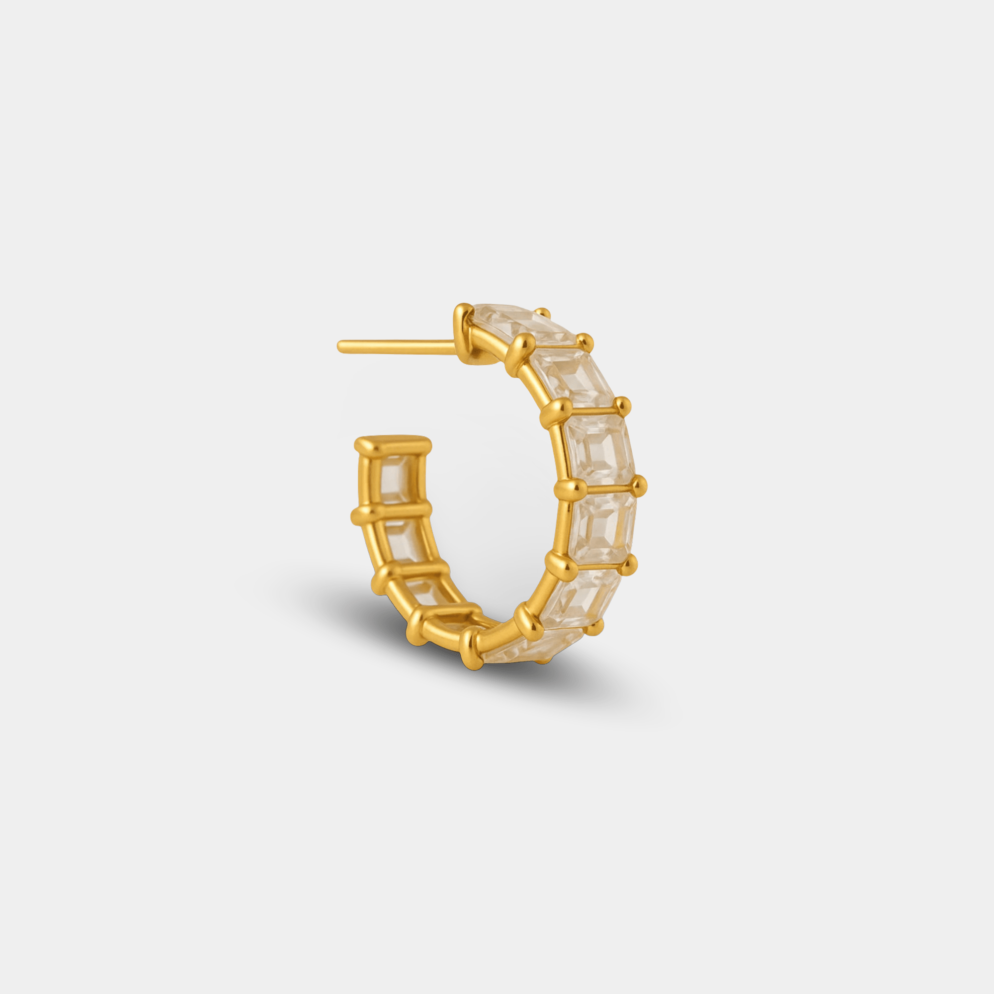 Side-angle view of the prism crown hoop earrings highlighting the geometric prism silhouette