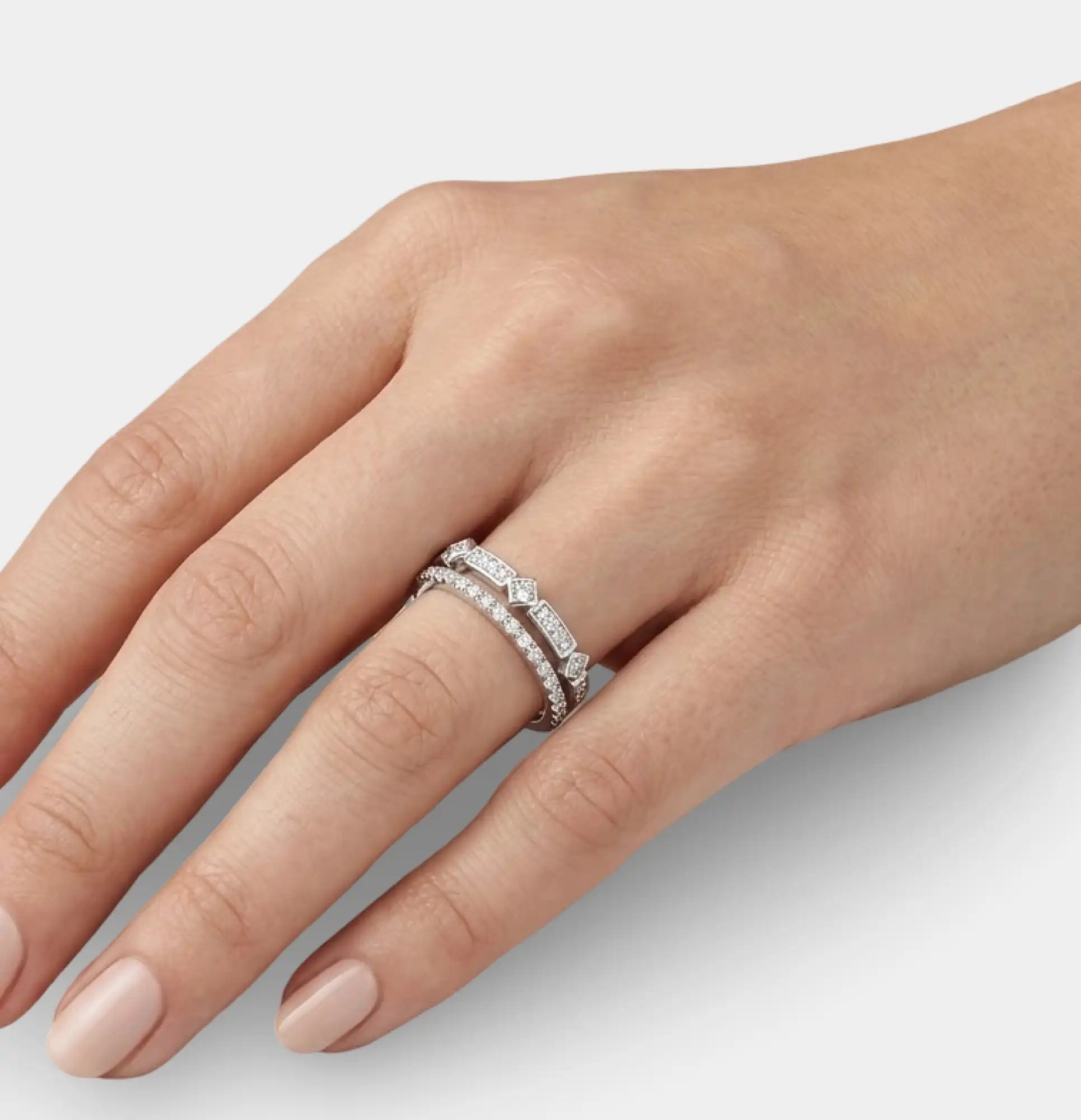Moissanite half eternity band in 925 silver on a woman's hand, stacked ring look by MH Elegance