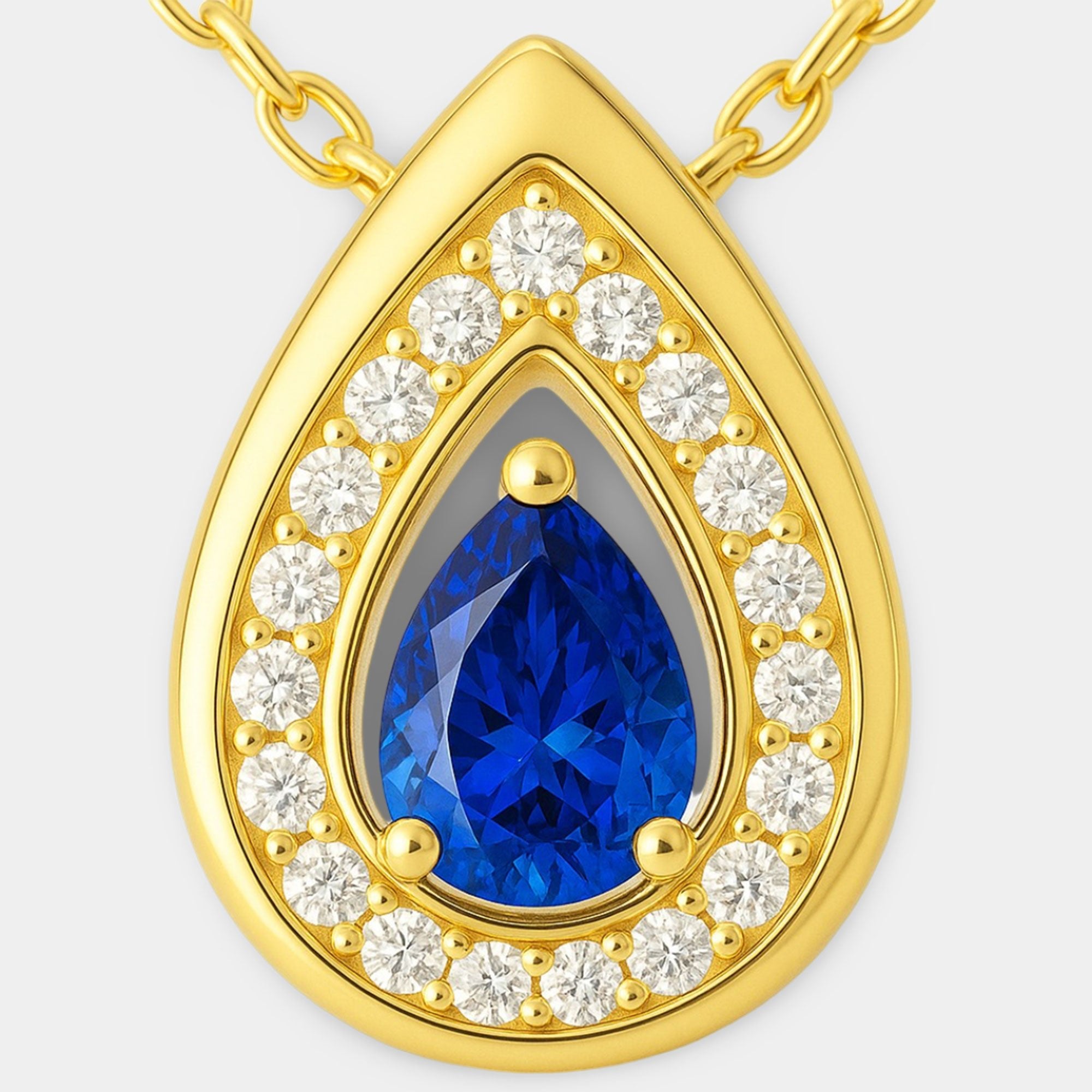 Teardrop sapphire pendant shown with its gold-plated chain and lobster clasp.