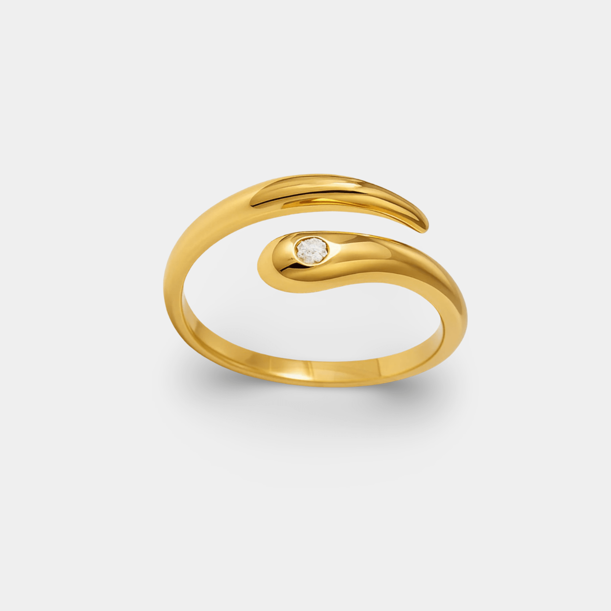 Gold wave wrap ring with a round cubic zirconia stone in waterproof 18K gold plated stainless steel, front angle