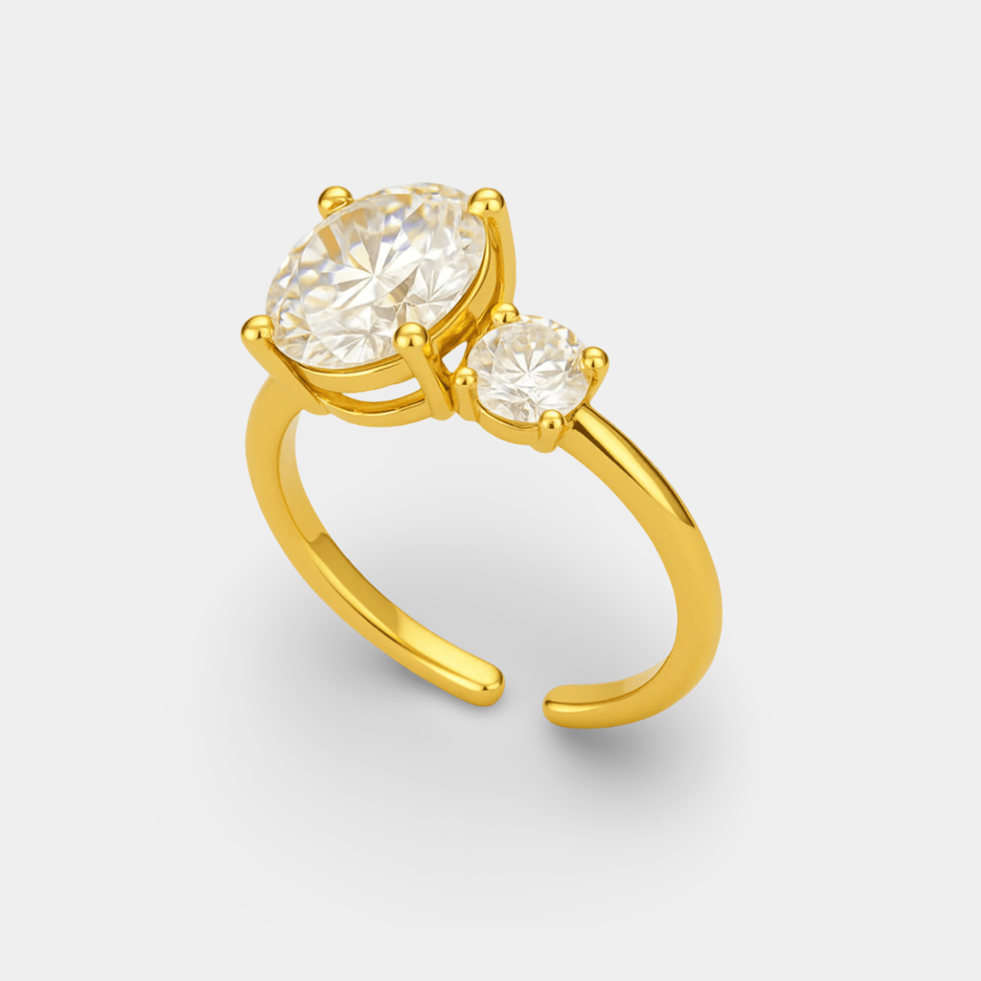 Front angled view of the adjustable open gold band and three matched CZ stones on the triple stone ring