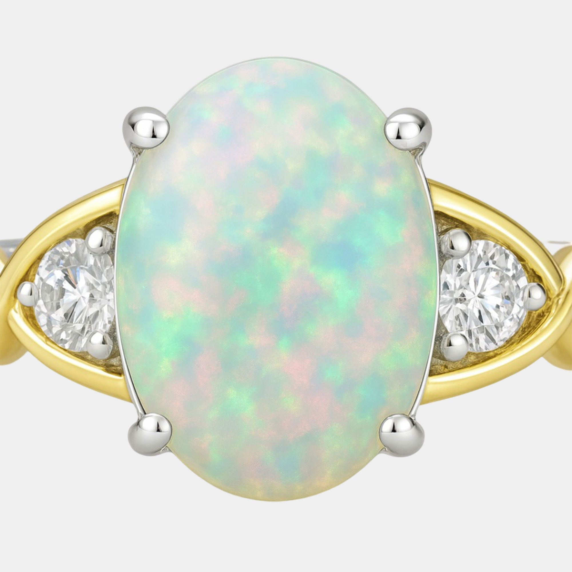 Two-tone opal crossover ring shown from the side with gold and silver bands.