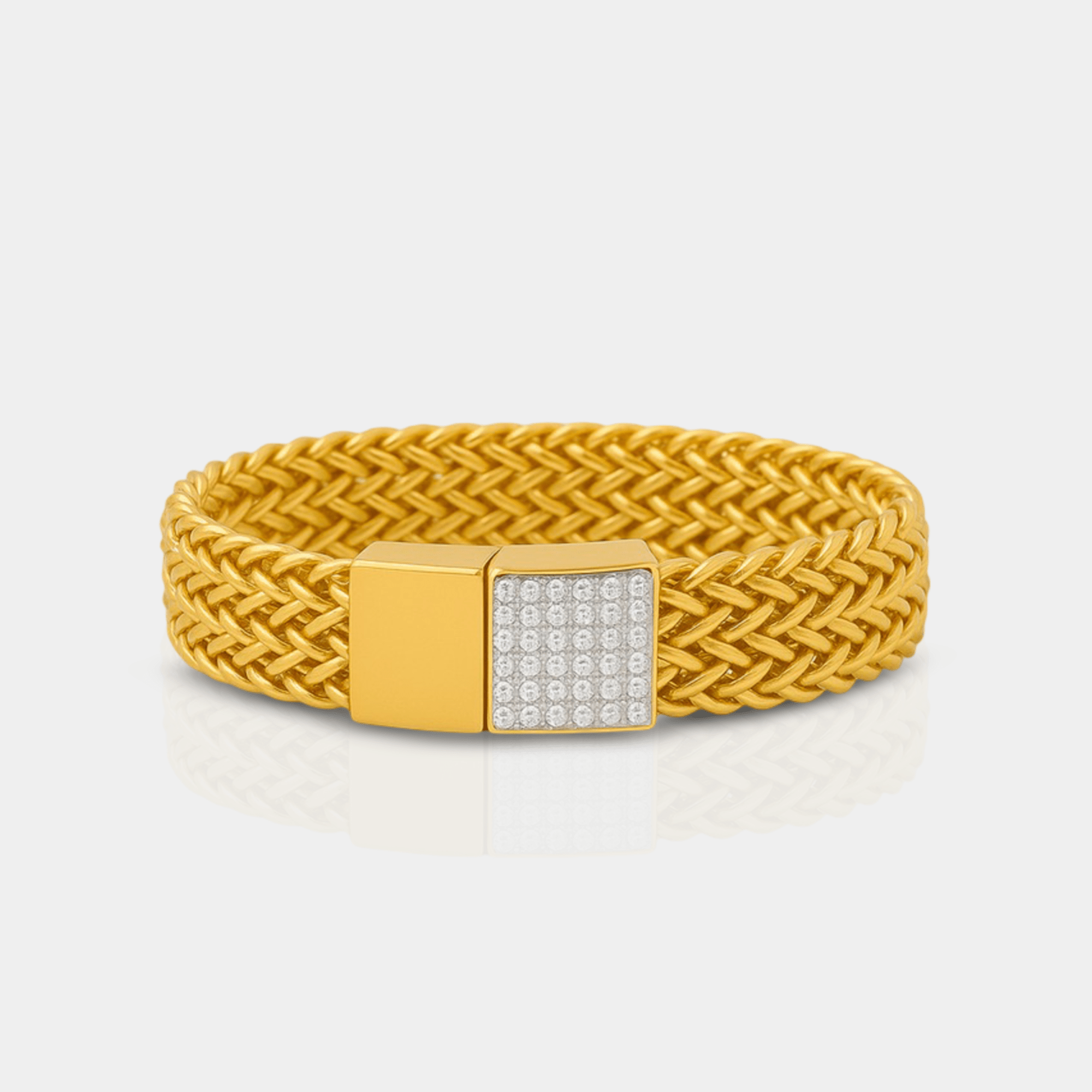 Gold mesh bracelet worn on a woman's wrist showing the smooth flat band
