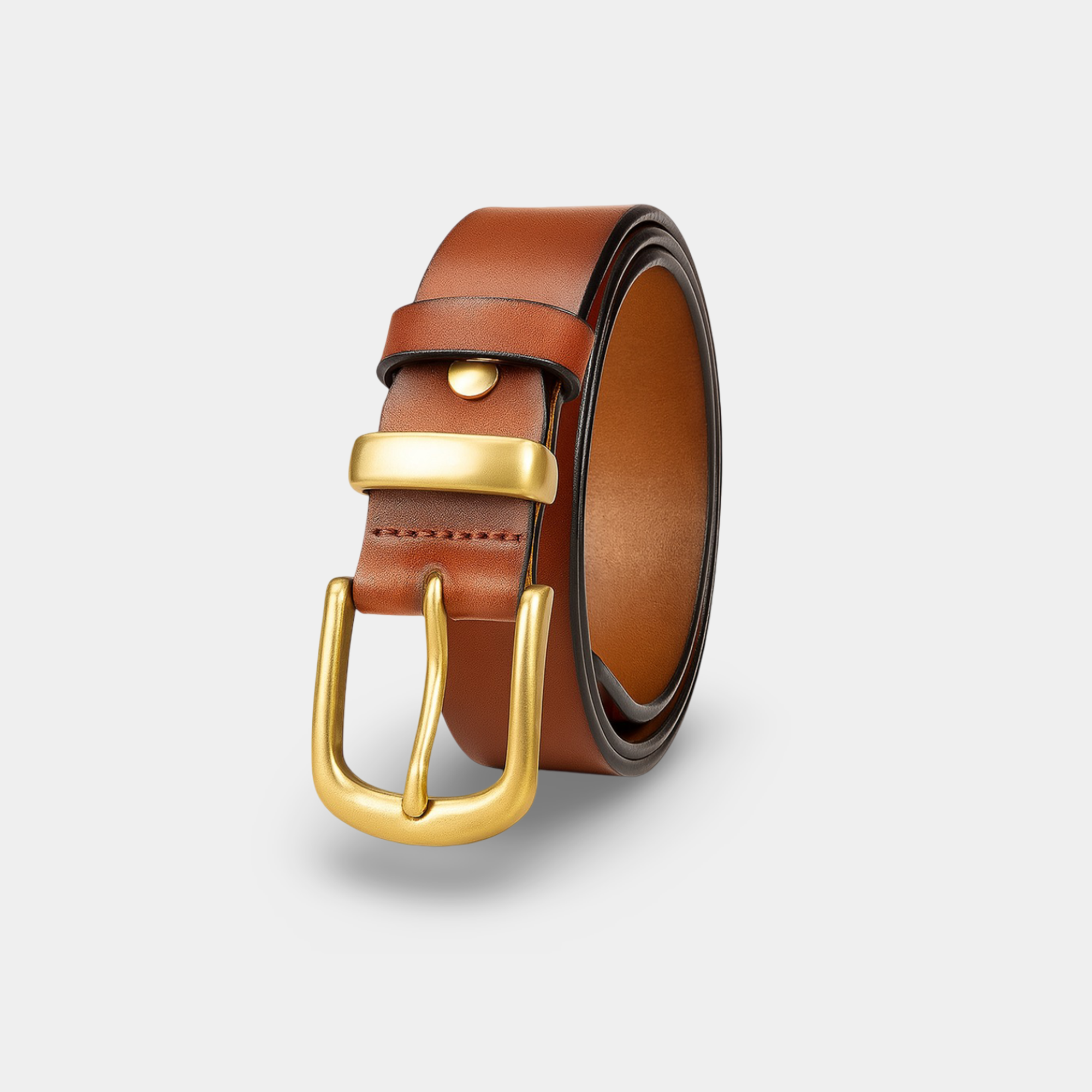 Women's Italian leather belt with polished gold buckle, premium full-grain construction showing rich cognac leather tone and luxury hardware