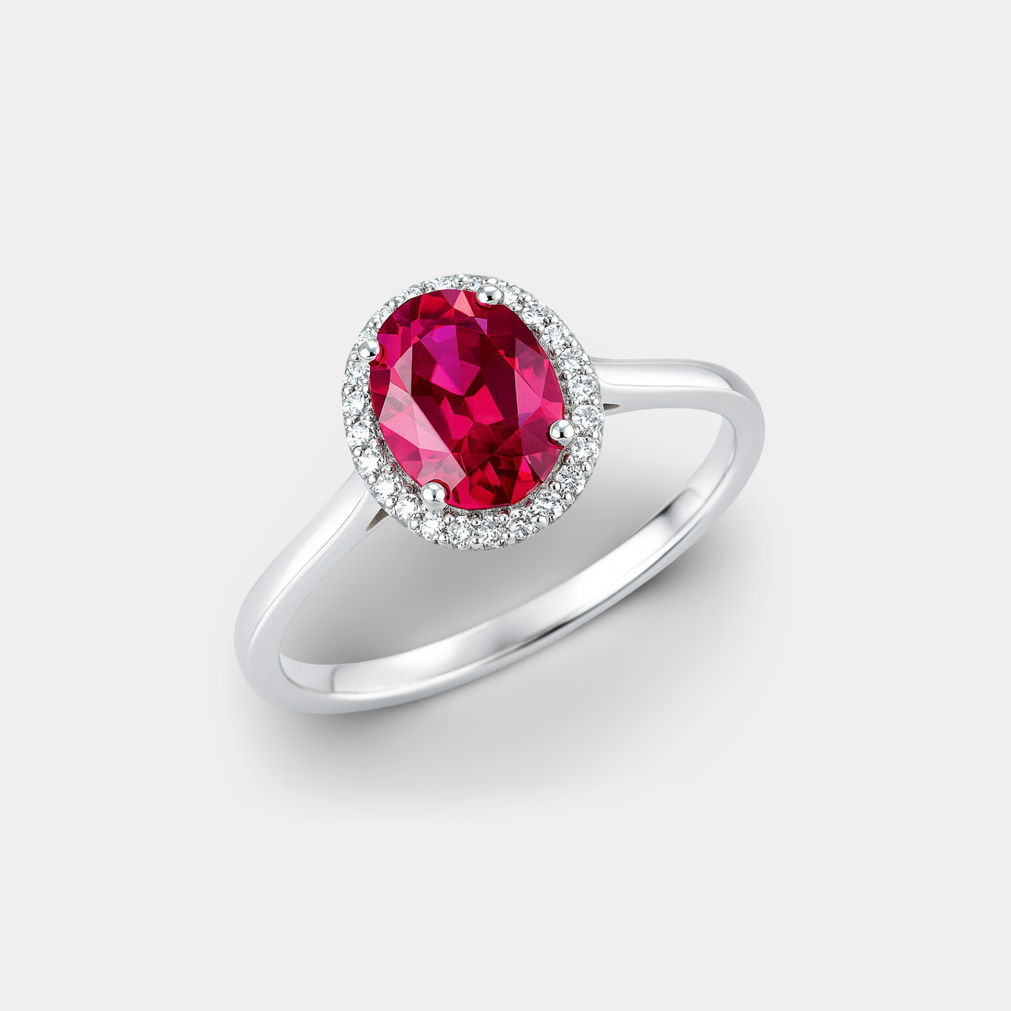 White Gold Oval Ruby & Diamond Halo Ring